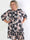 Daisy - Blomstret plus size kjole i viskose med flæsekant forneden