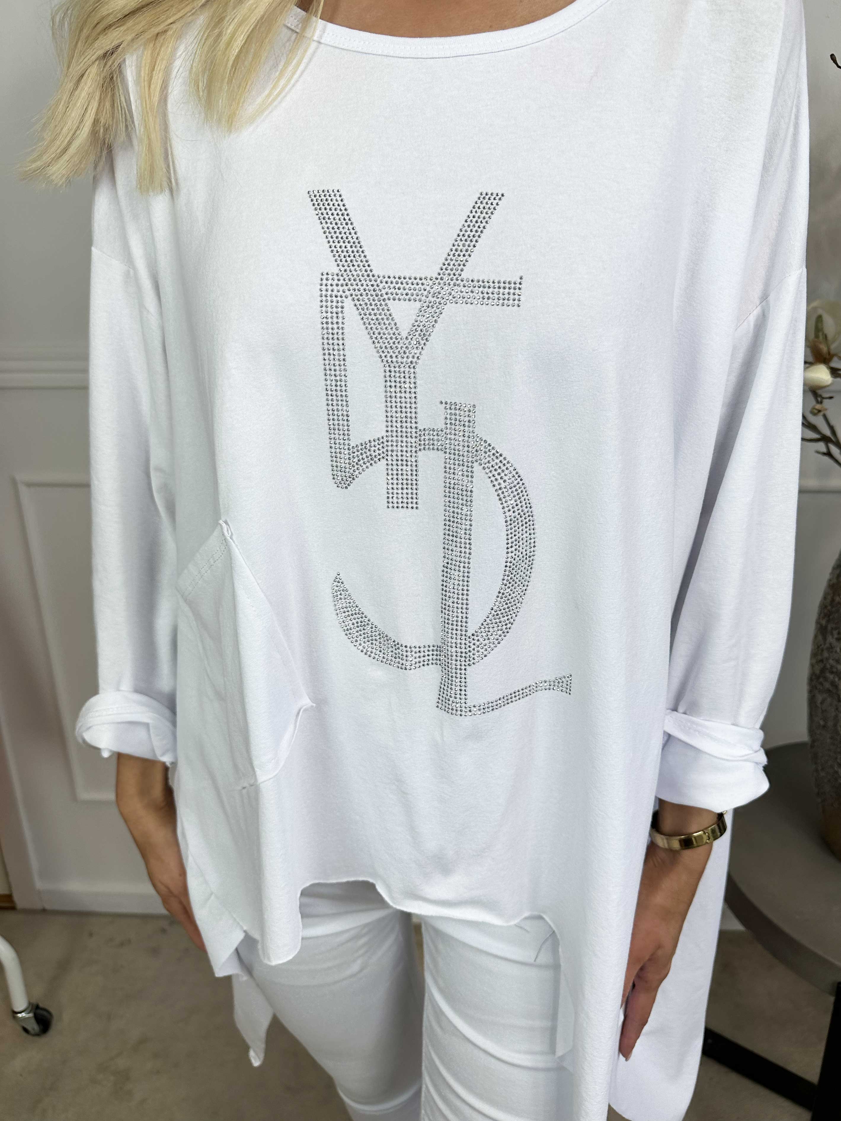 Daniella - Bluse med forskellige snit og similisten på brystet