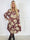 Ebba Bloom - Plus size kjole i et krølfrit stof med blomstermotiv og små gulddetaljer