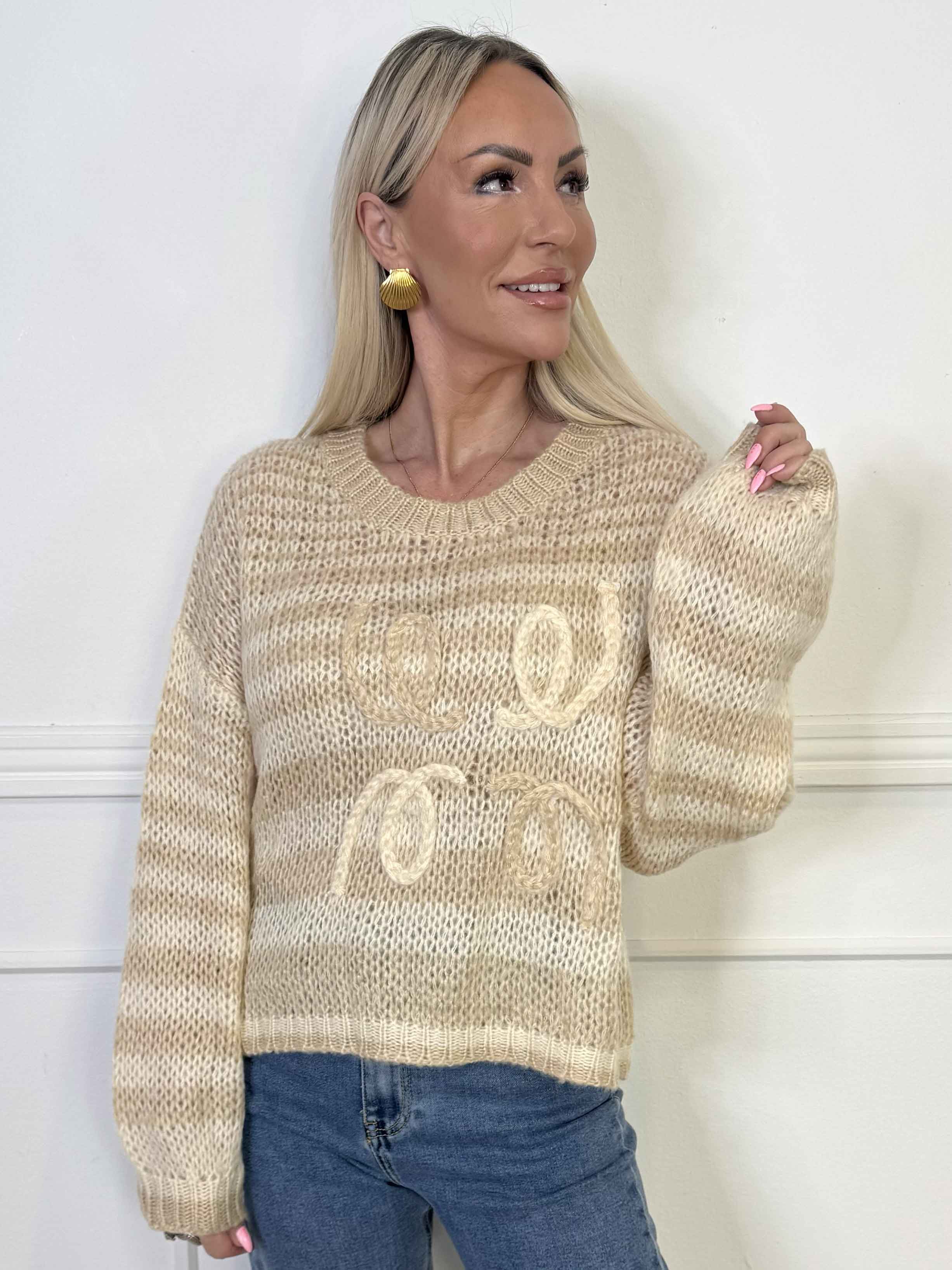 Sevillia - Hyggelig sort og hvid stribet strik