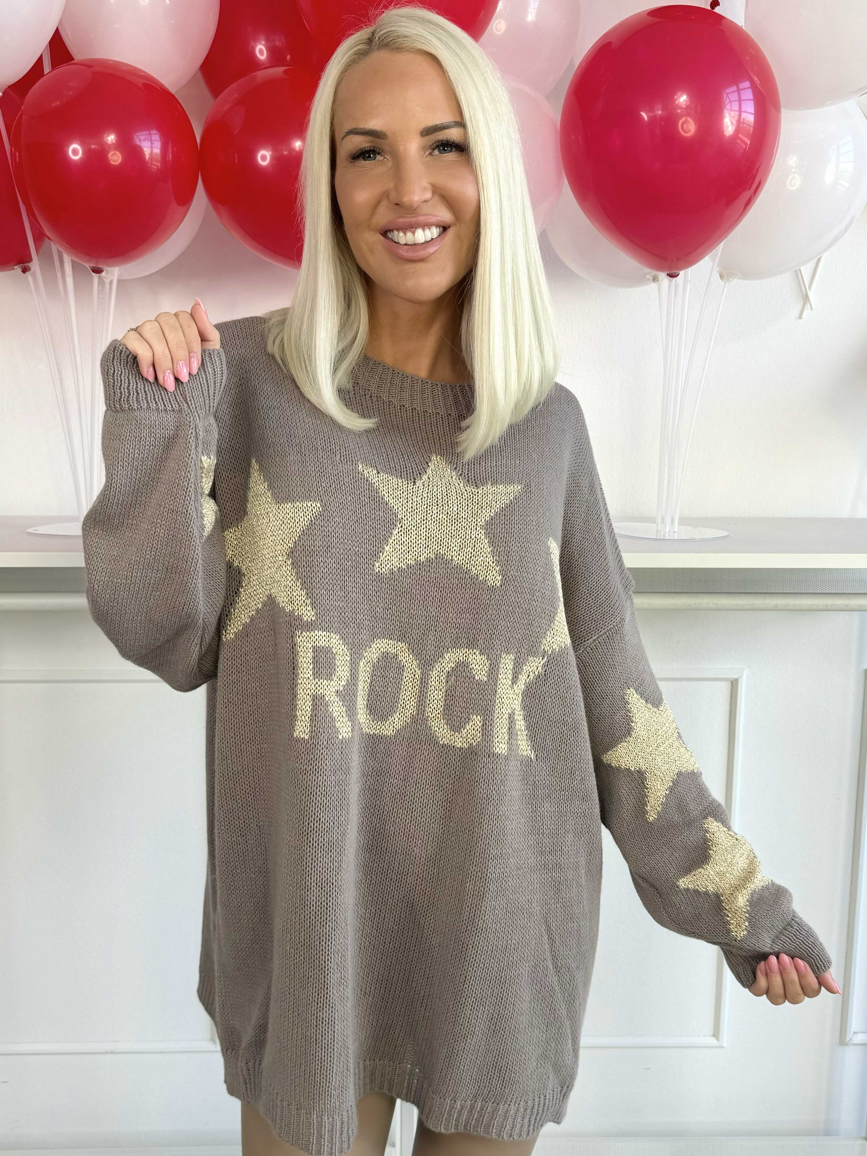 Rock - Strikbluse med stjerner i guldtråde