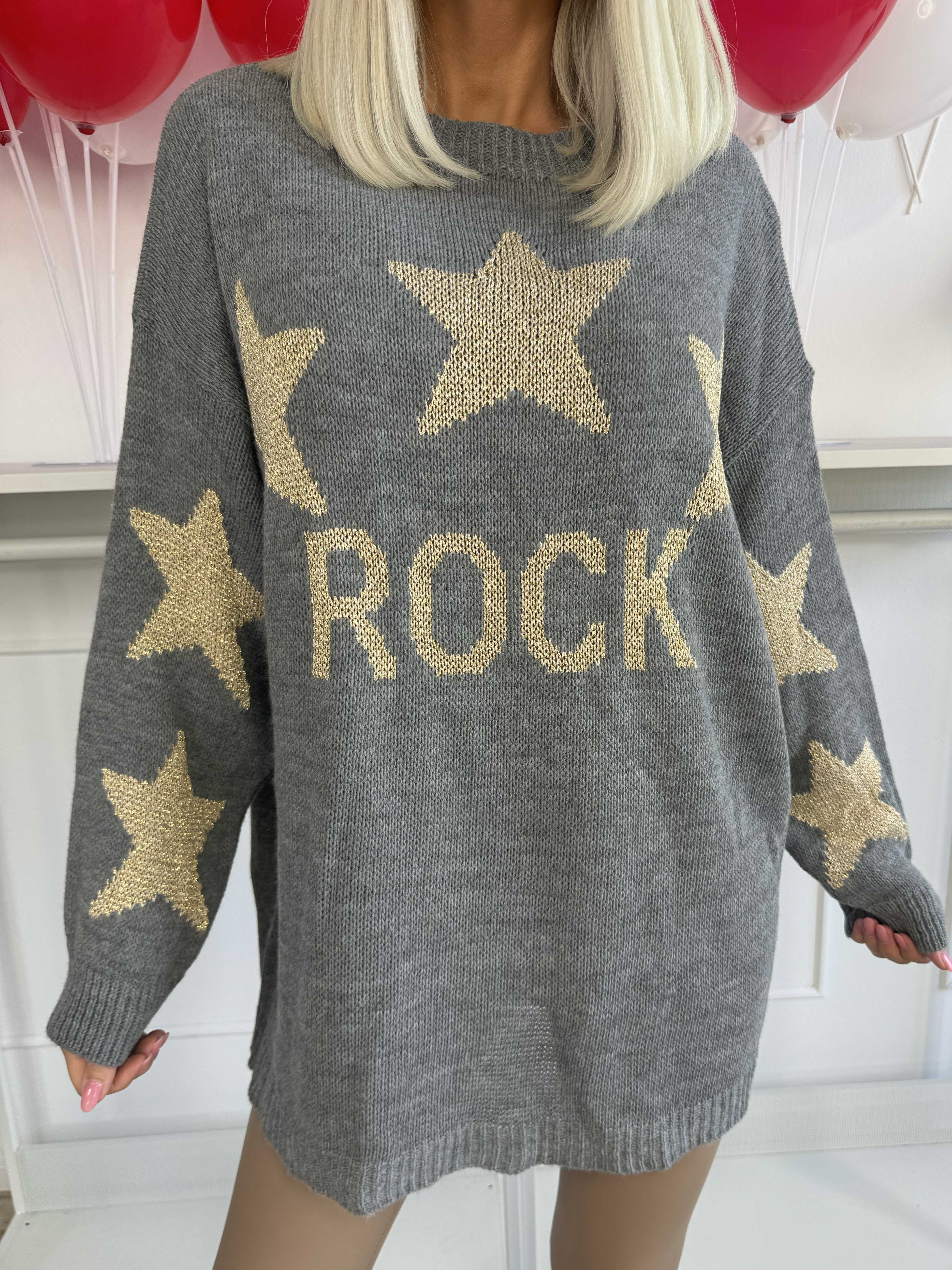 Rock - Strikbluse med stjerner i guldtråde