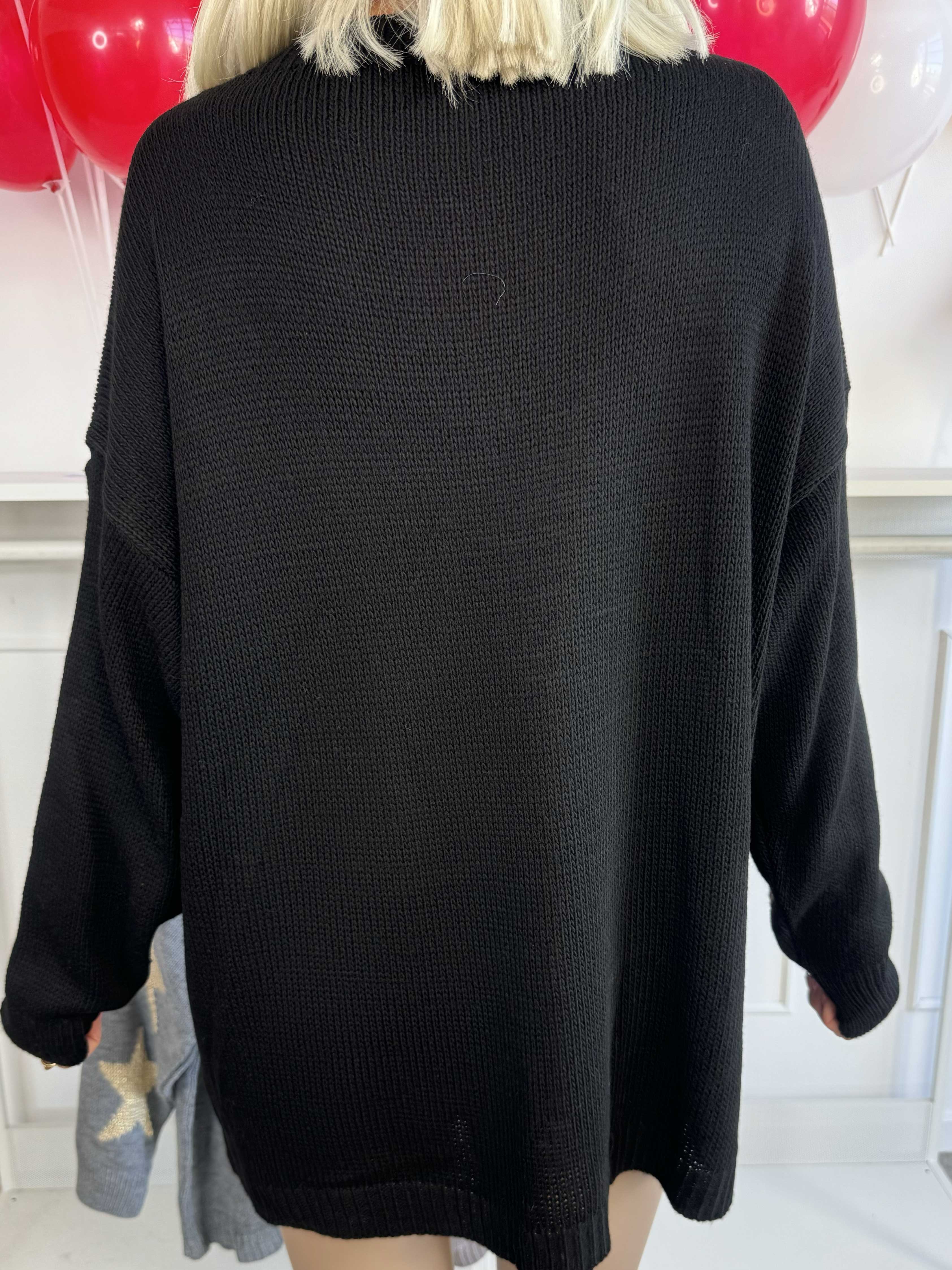 Rock - Strikbluse med stjerner i guldtråde