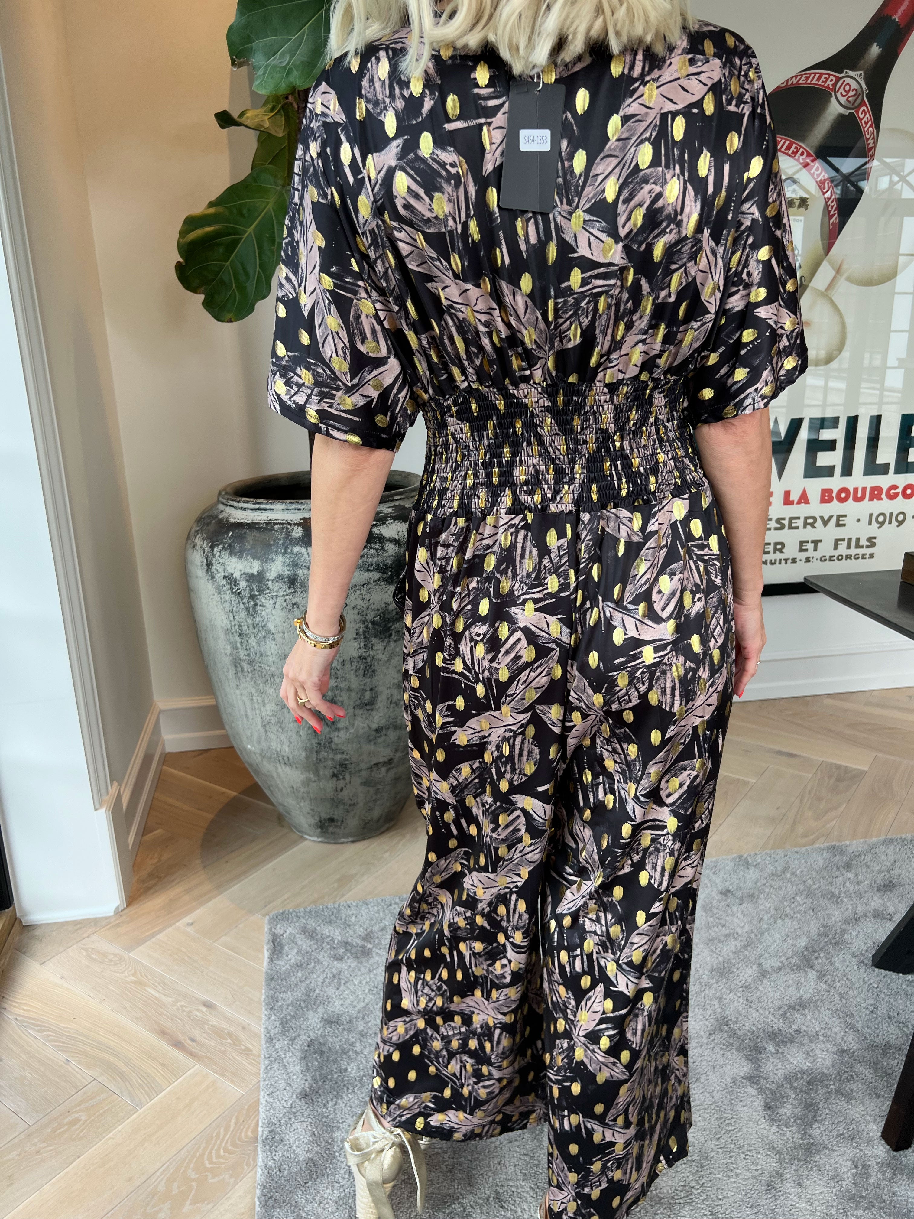 Pams Leafage Jumpsuit - Elastisk buksedragt i bladmønster med guld dutter