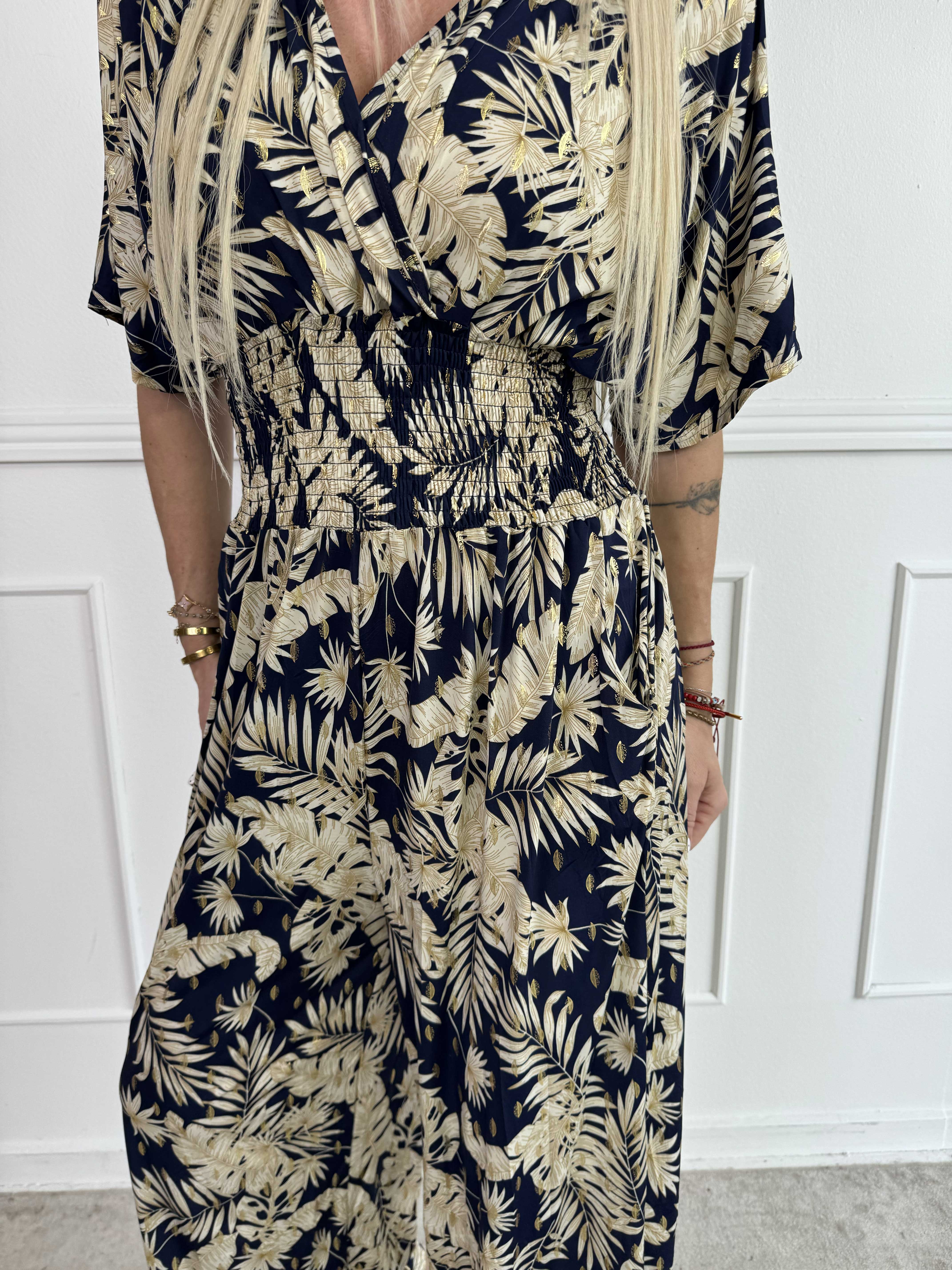 Pams Gold Leaf Jumpsuit - Elastisk buksedragt med blad mønster og guld dutter