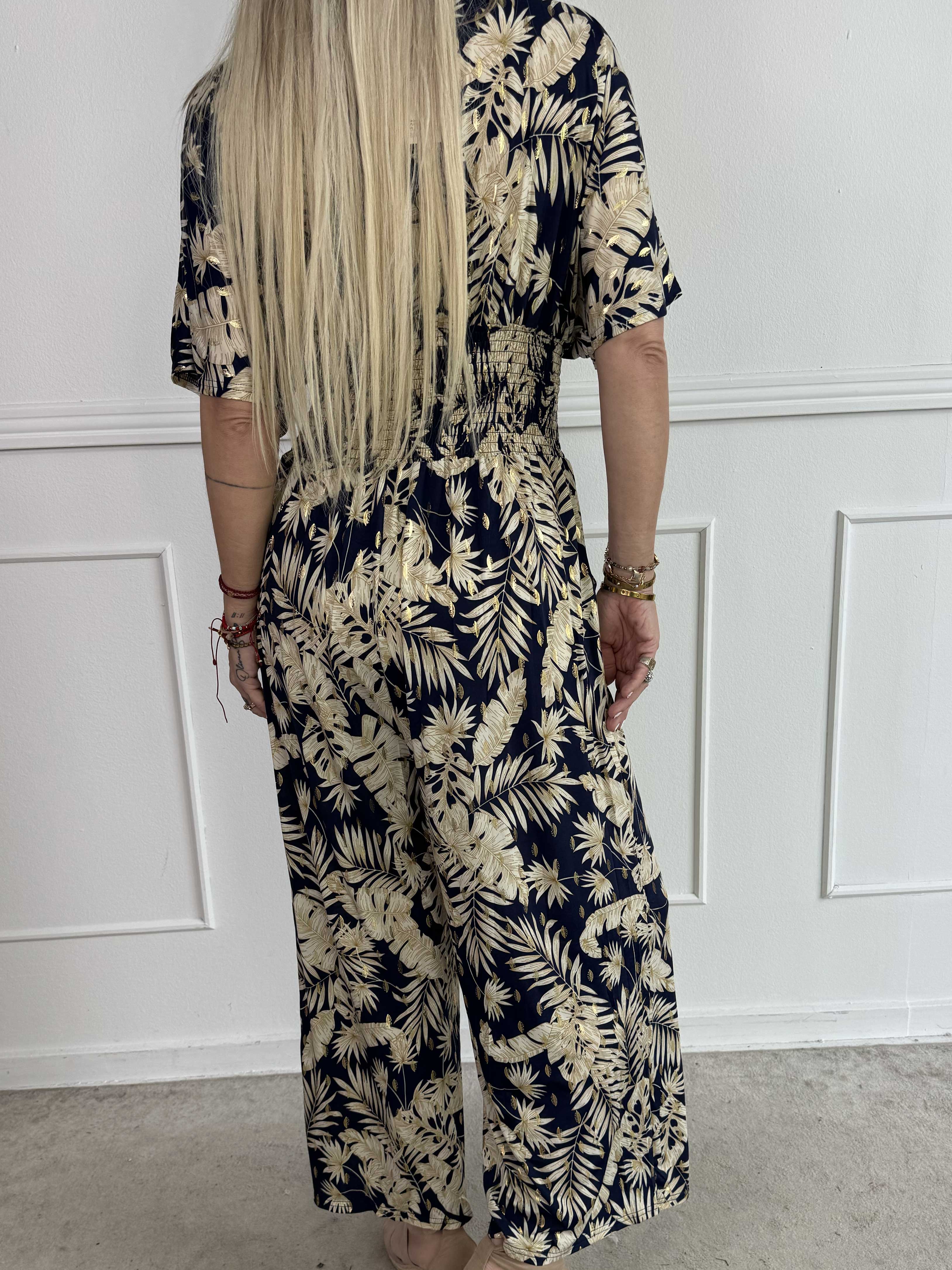 Pams Gold Leaf Jumpsuit - Elastisk buksedragt med blad mønster og guld dutter