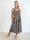 Marisol Stripe - Stribet plus size sommerkjole i viskose med smock henover brystet
