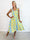Marisol Sunburst - Blomstret plus size sommerkjole i viskose med smock henover brystet