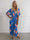 Pams Raise Jumpsuit - Elastisk buksedragt med blomsterr og guldsommerfugle