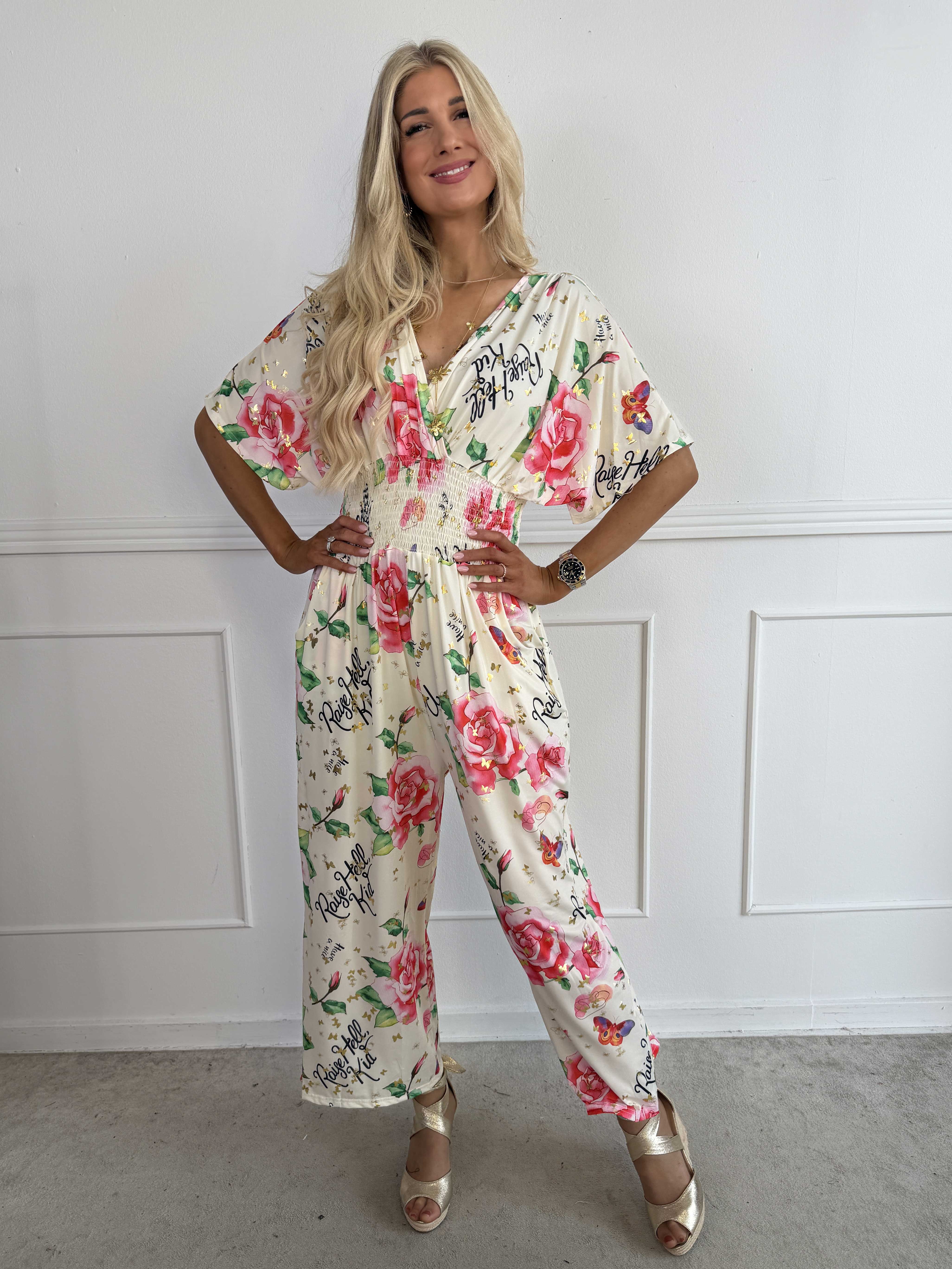 Pams Raise Jumpsuit - Elastisk buksedragt med blomsterr og guldsommerfugle