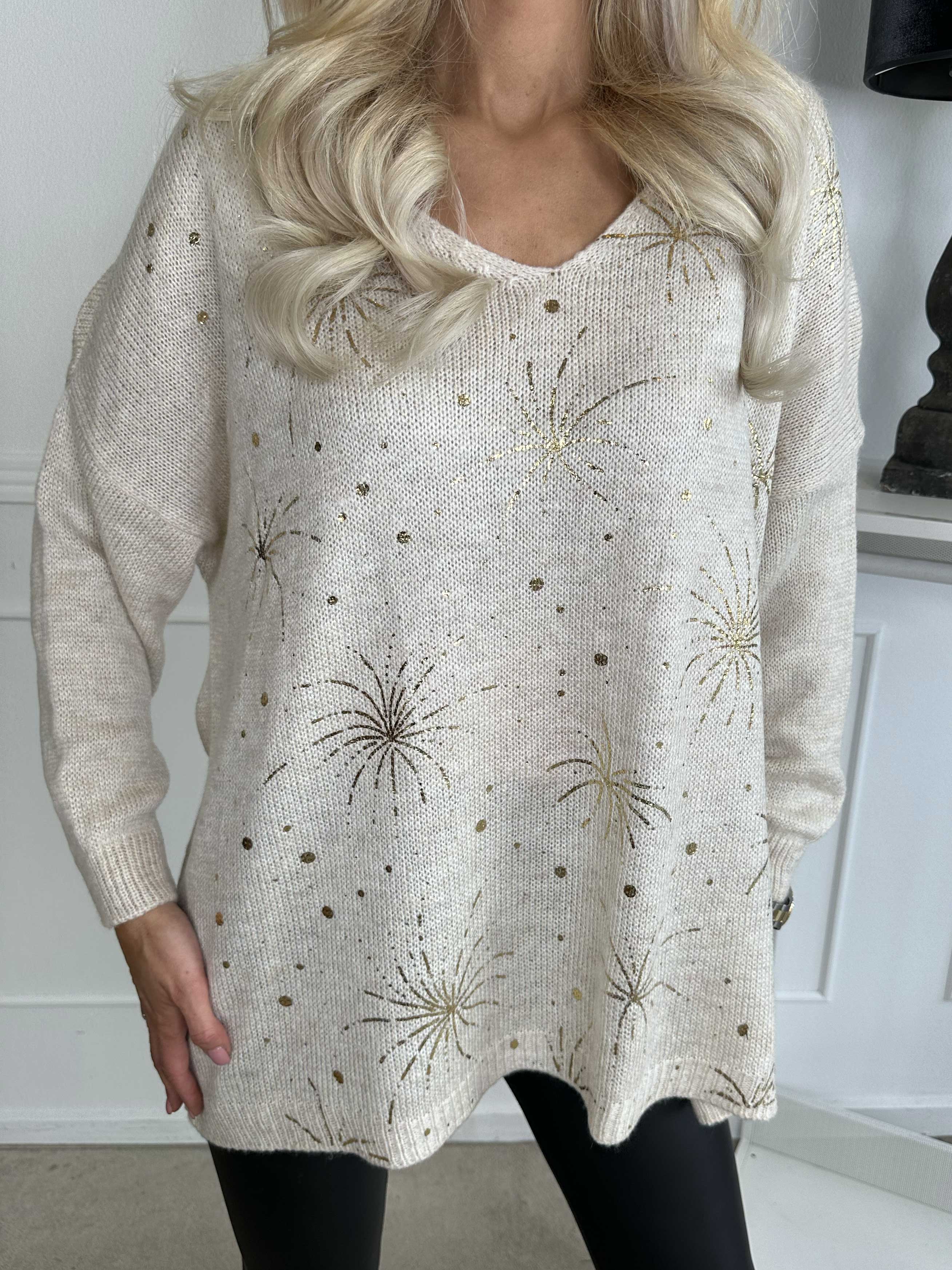 Omaria - Strikbluse med fyrværkeri på