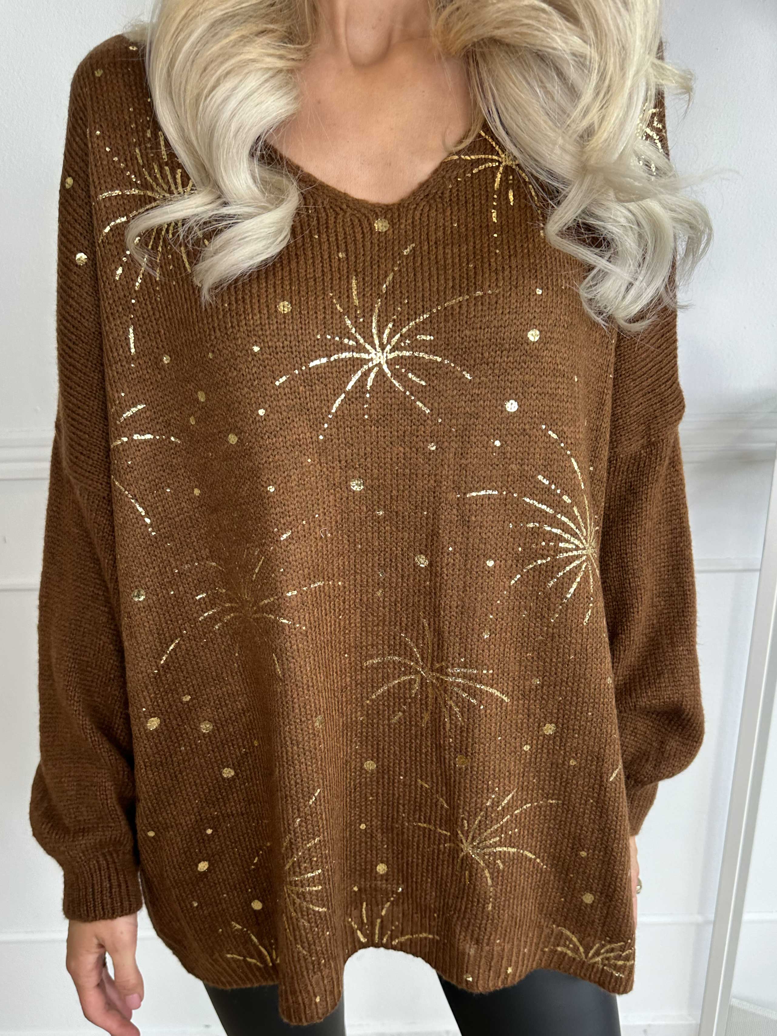 Omaria - Strikbluse med fyrværkeri på