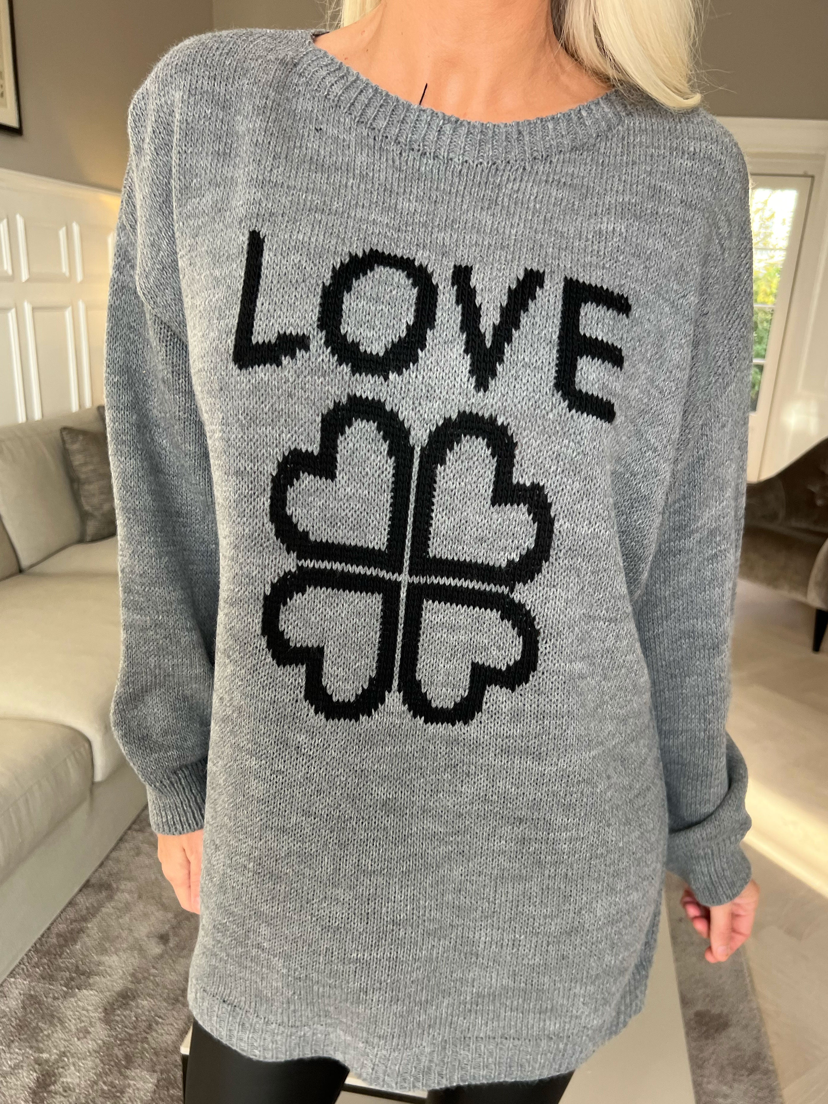 Mia - Strikbluse med firkløver på