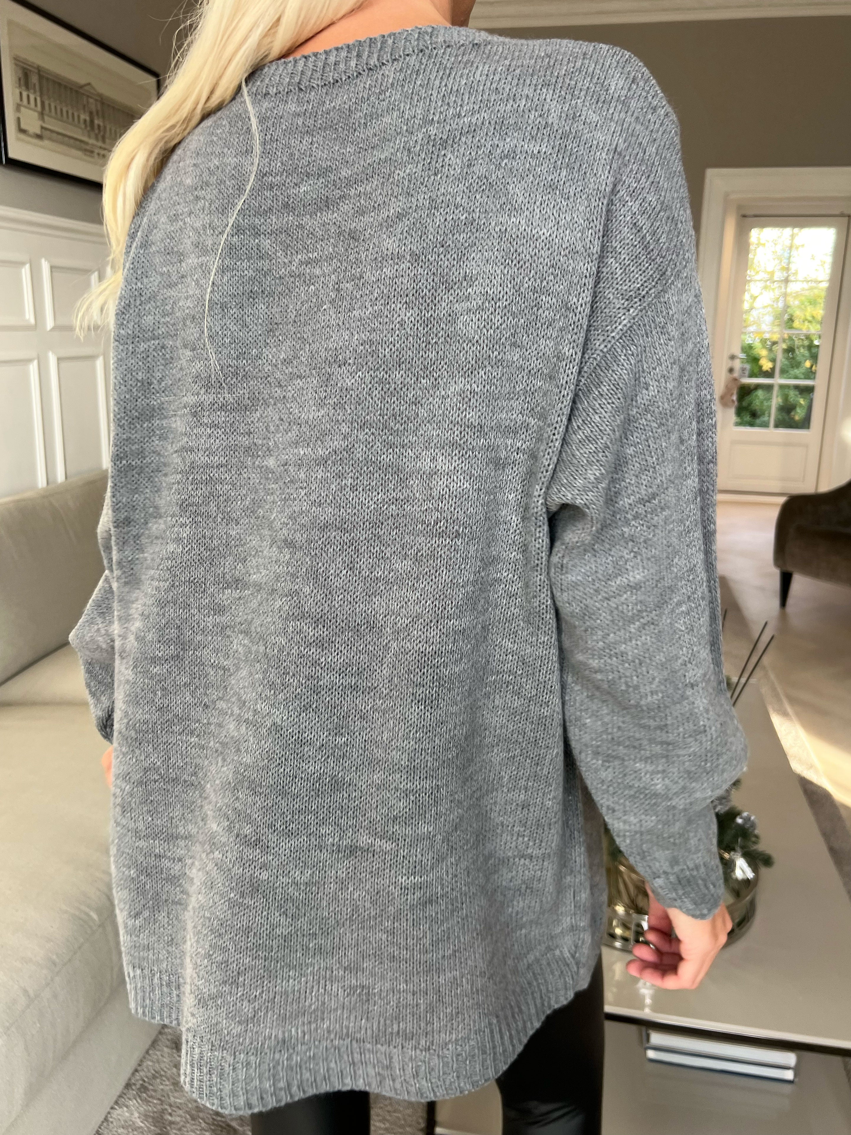 Mia - Strikbluse med firkløver på