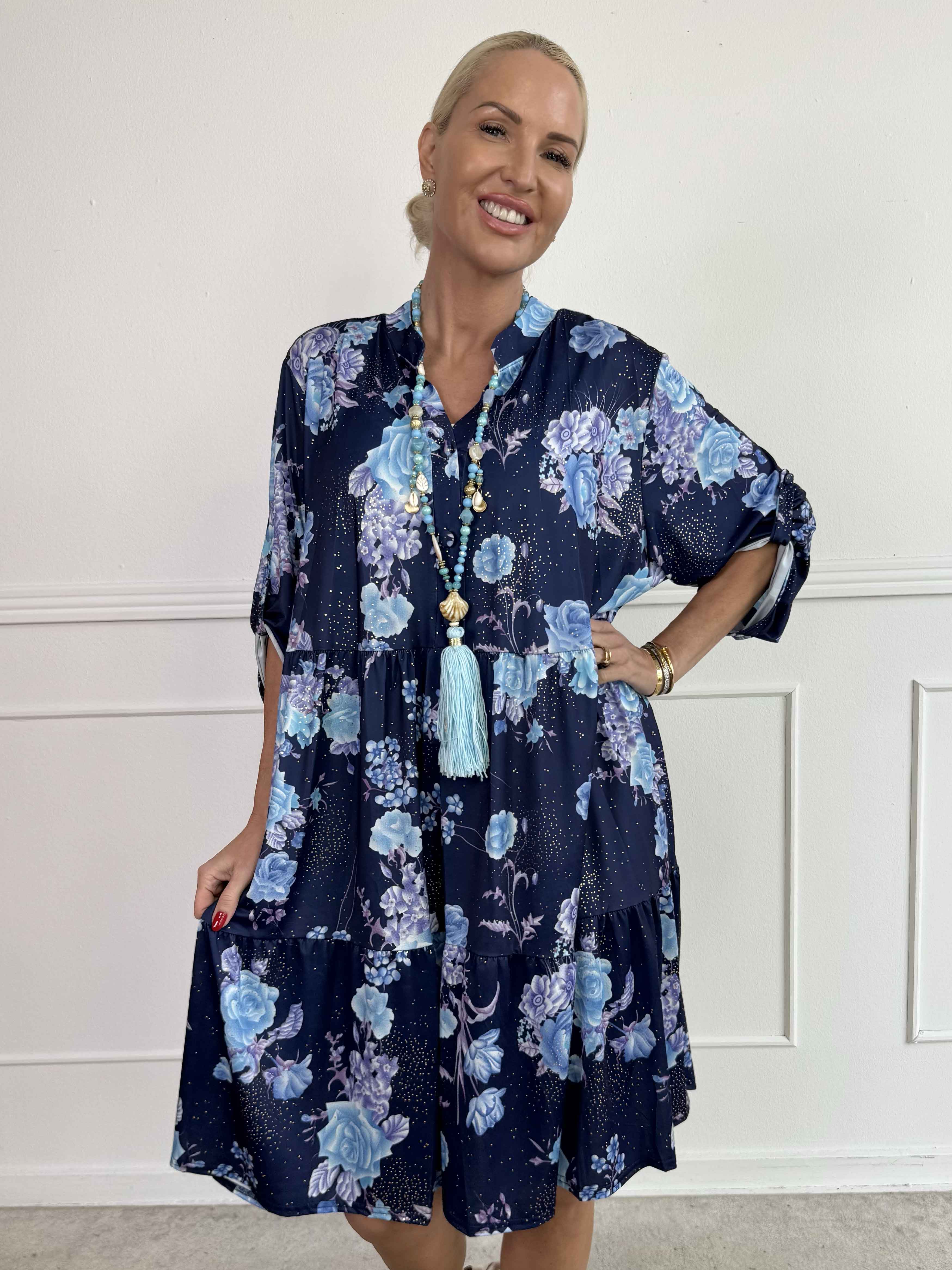 Milano Bouquet Midi - Elastisk kjole med smukt blomsterprint og diskret guldglimmer