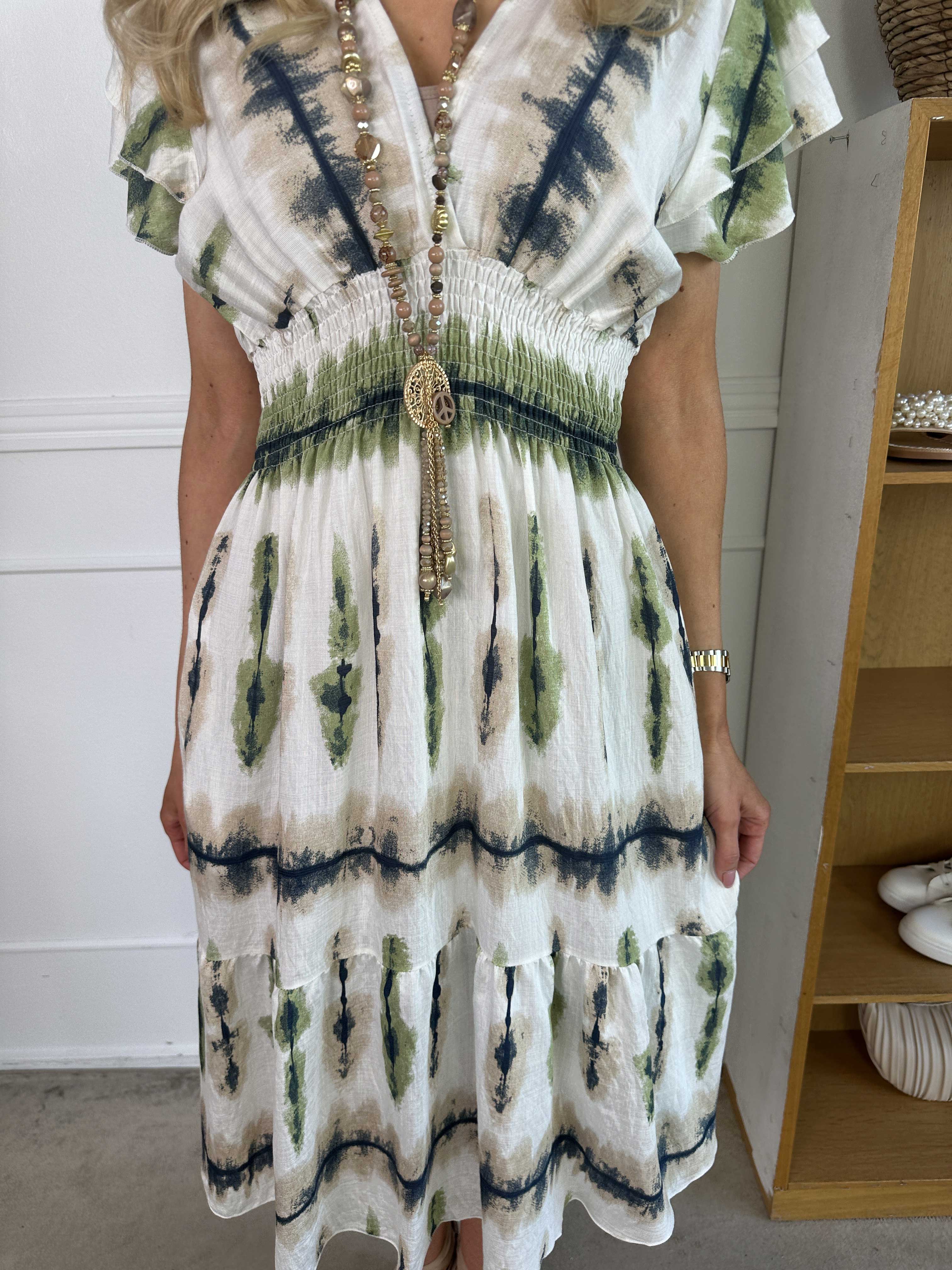 Niko - Sød kjole i viskose med smock under brystet og lommer