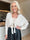 Odette - Kort og feminin strikcardigan, der lukkes med en fin sløjfe ved brystet