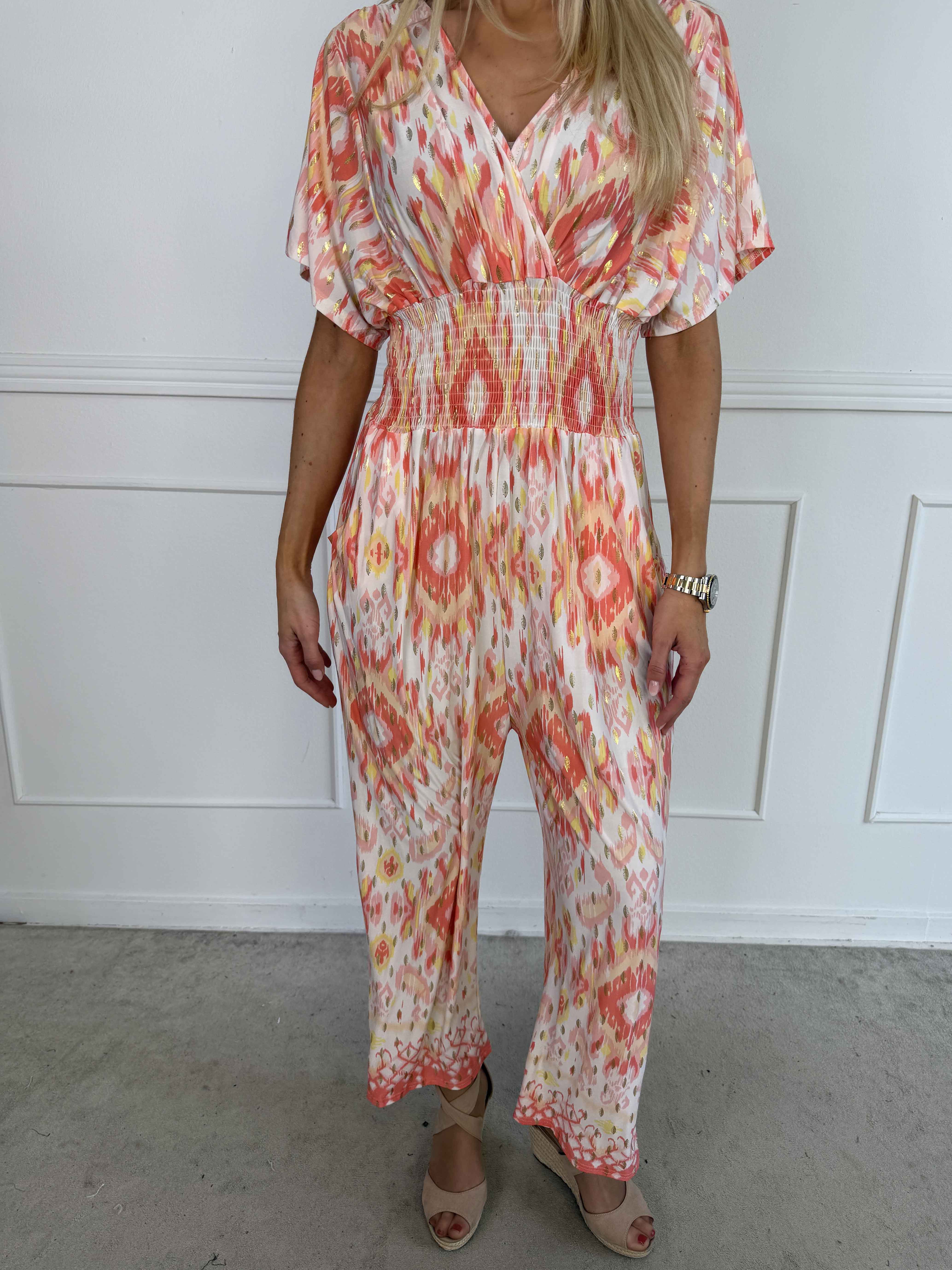 Pams Artsy Jumpsuit - Elastisk mønstret buksedragt med guld dutter