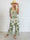 Pams Palm Jumpsuit - Elastisk buksedragt med palmeprint