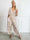 Pams Tribal Jumpsuit - Elastisk mønstret buksedragt med små guld blomster