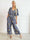 Pams Tribal Jumpsuit - Elastisk mønstret buksedragt med små guld blomster