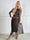 Viola - Elegant og feminin kjole i stretchy mesh med transparente ærmer