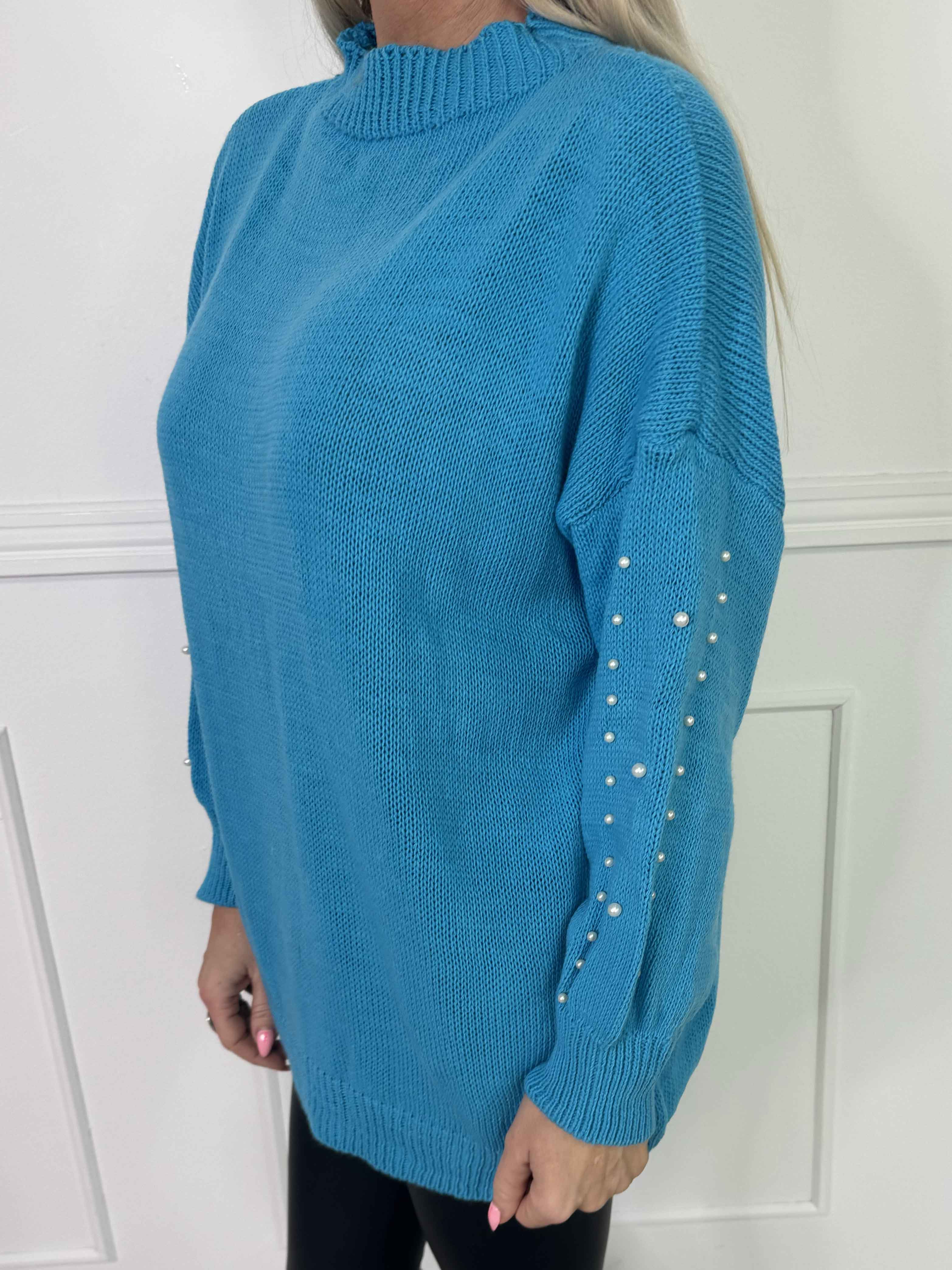 Viviane - Strik detaljeret med hvide perler og ballonærmer