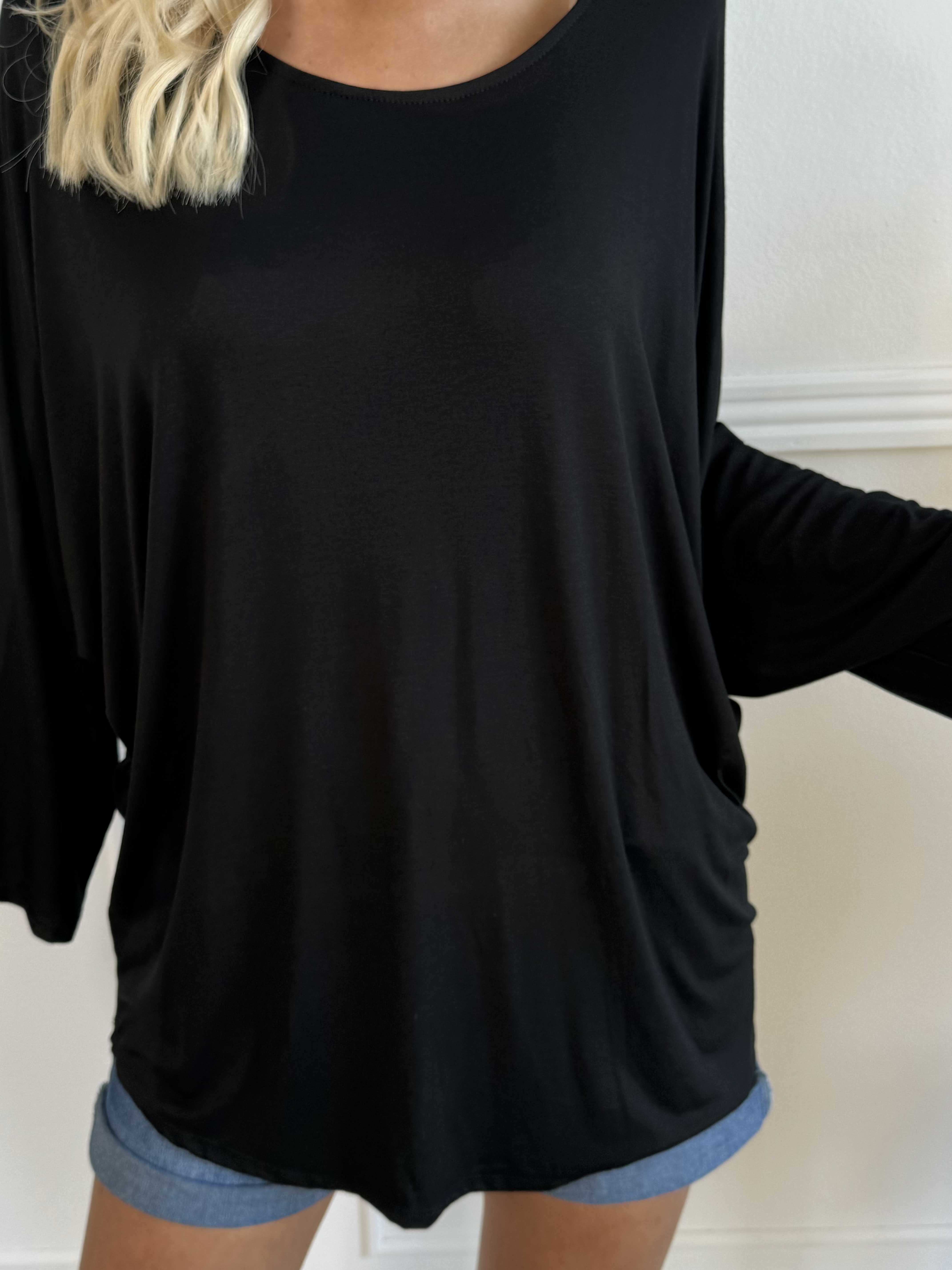 Augustine - Bluse i elastisk stof med flagermusærmer