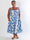 Marisol Sunburst - Blomstret plus size sommerkjole i viskose med smock henover brystet