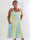 Marisol Sunburst - Blomstret plus size sommerkjole i viskose med smock henover brystet