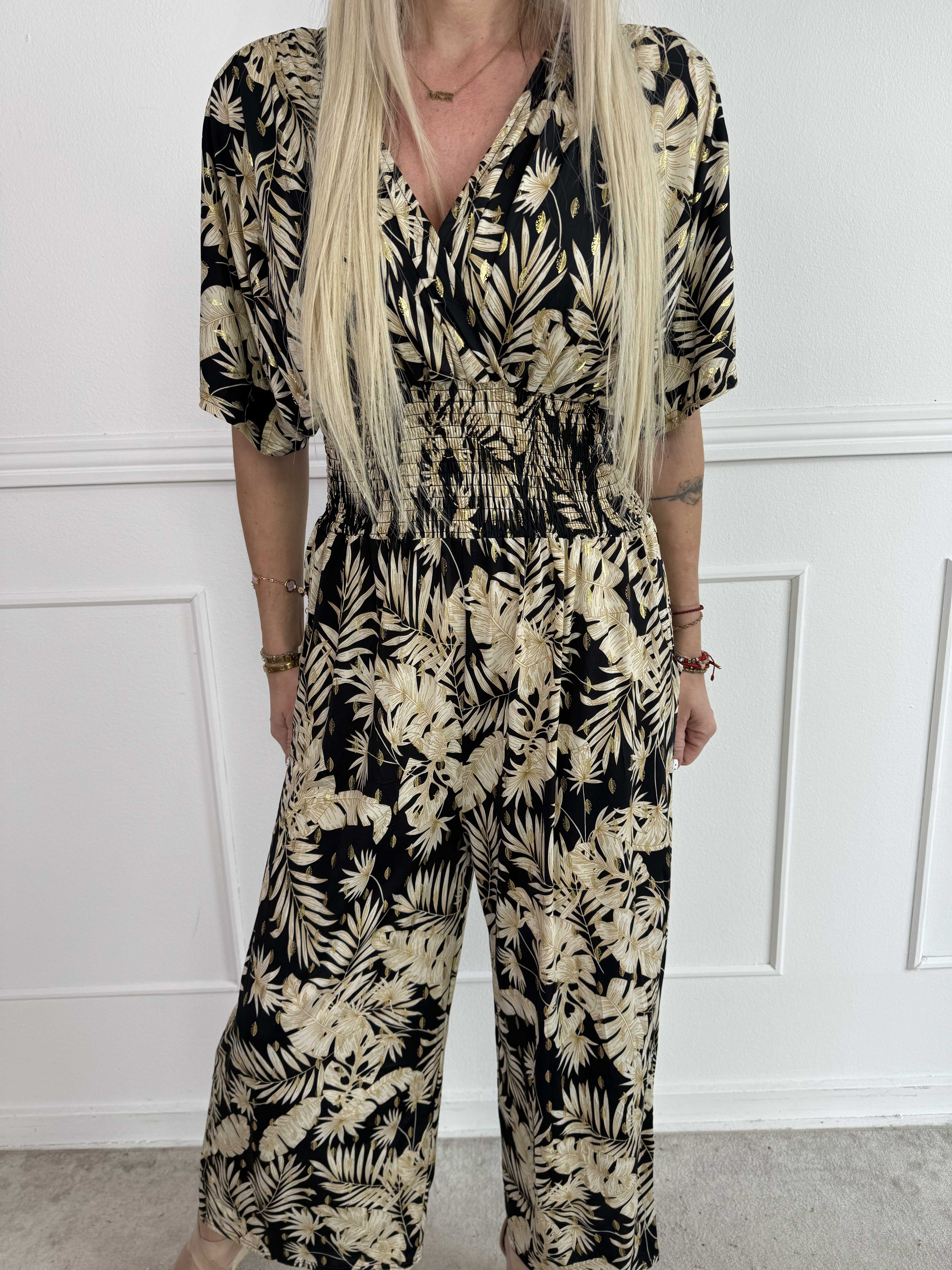 Pams Gold Leaf Jumpsuit - Elastisk buksedragt med blad mønster og guld dutter