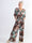 Pams Leaf Jumpsuit - Elastisk plus size buksedragt med bladmønster