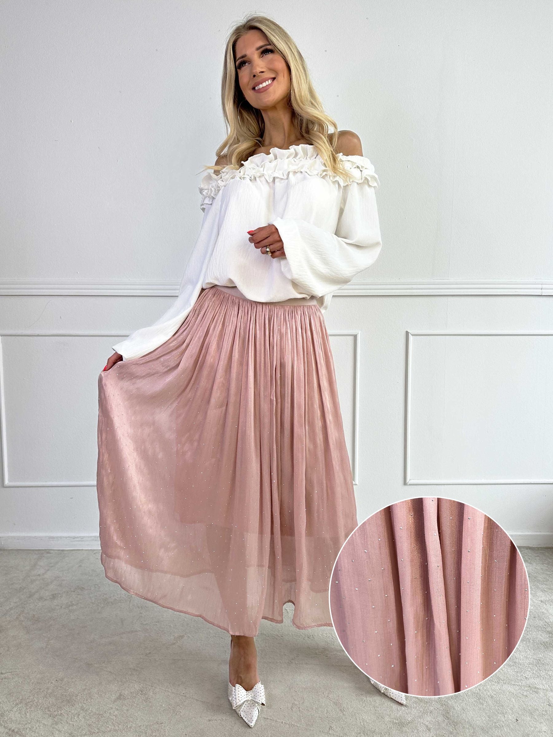 Afrodite - Feminin nederdel i shiny stof med similisten