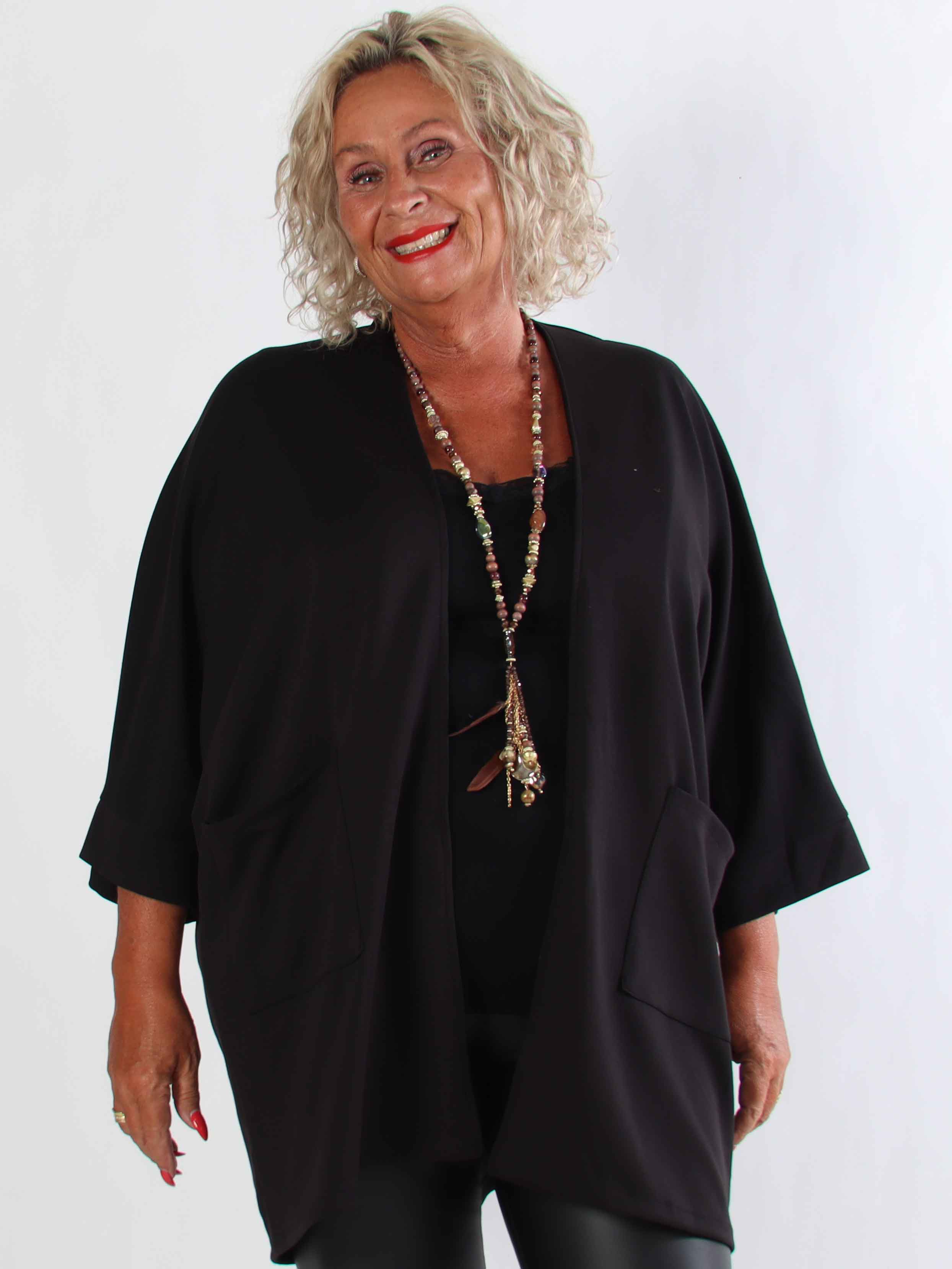 Annah Cardigan - Plus size blød cardigan med tydelige syninger og lommer