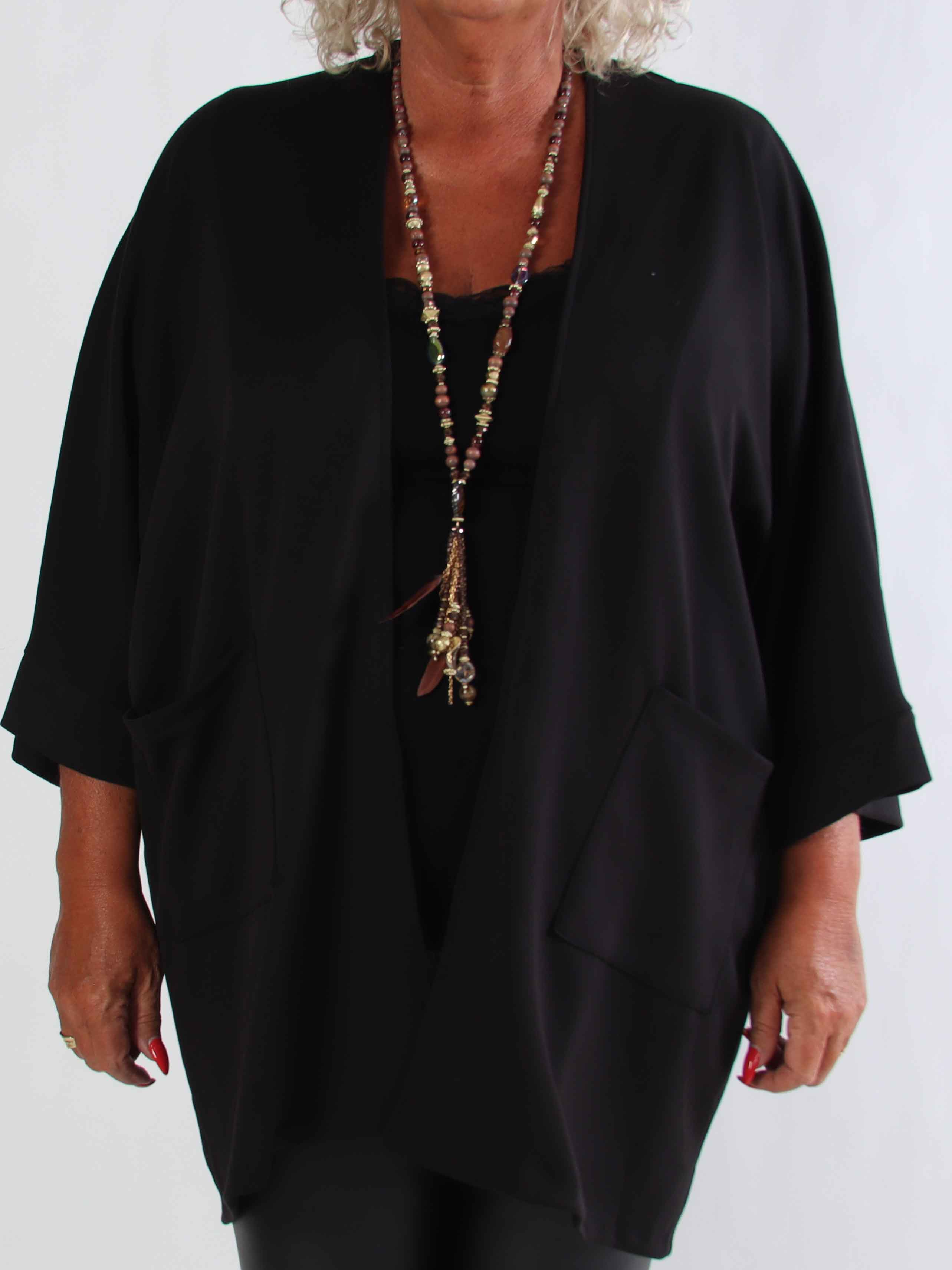 Annah Cardigan - Plus size blød cardigan med tydelige syninger og lommer