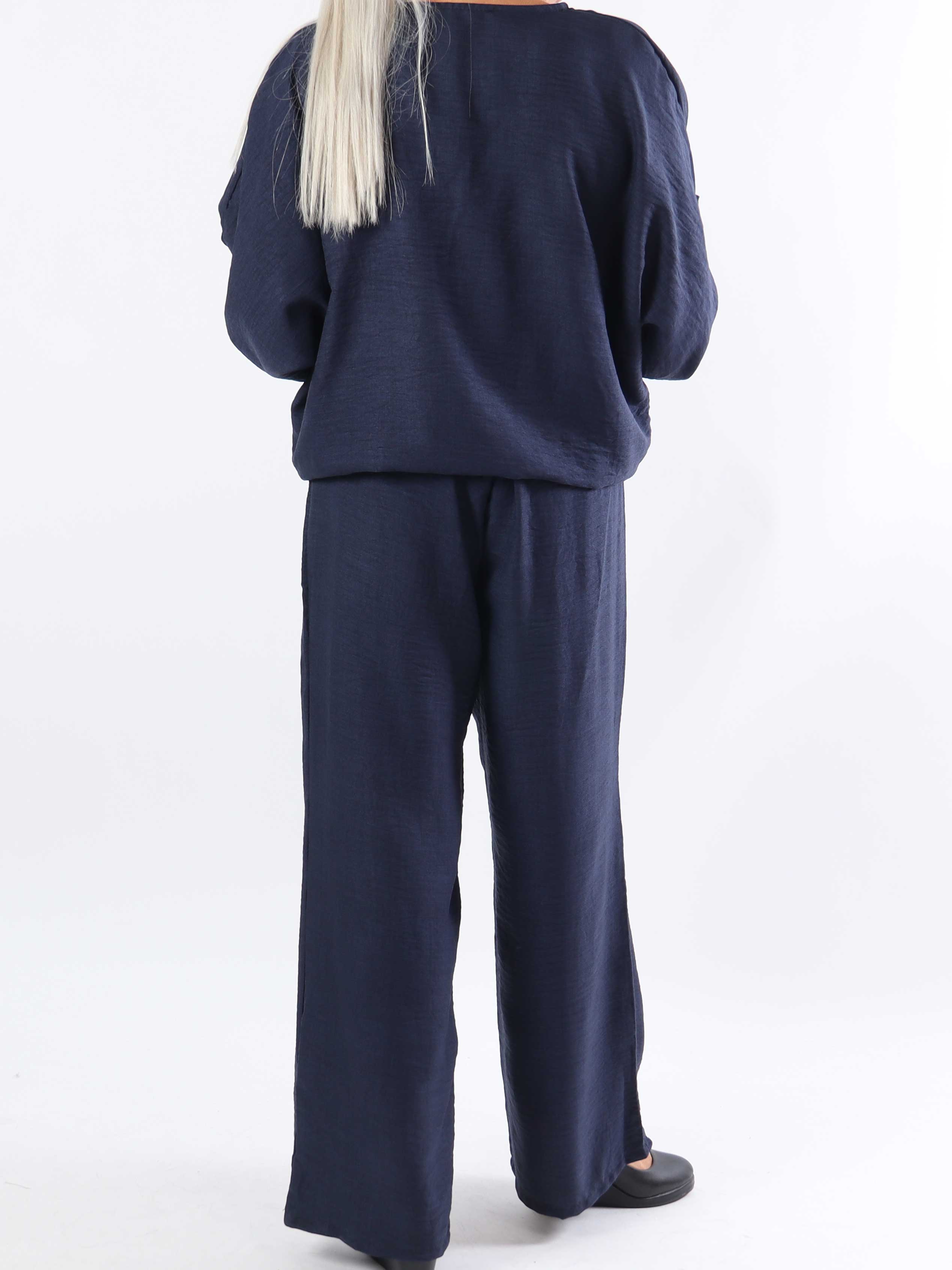 Bella - Sød plus size tunika med knude og aftagelig blomst