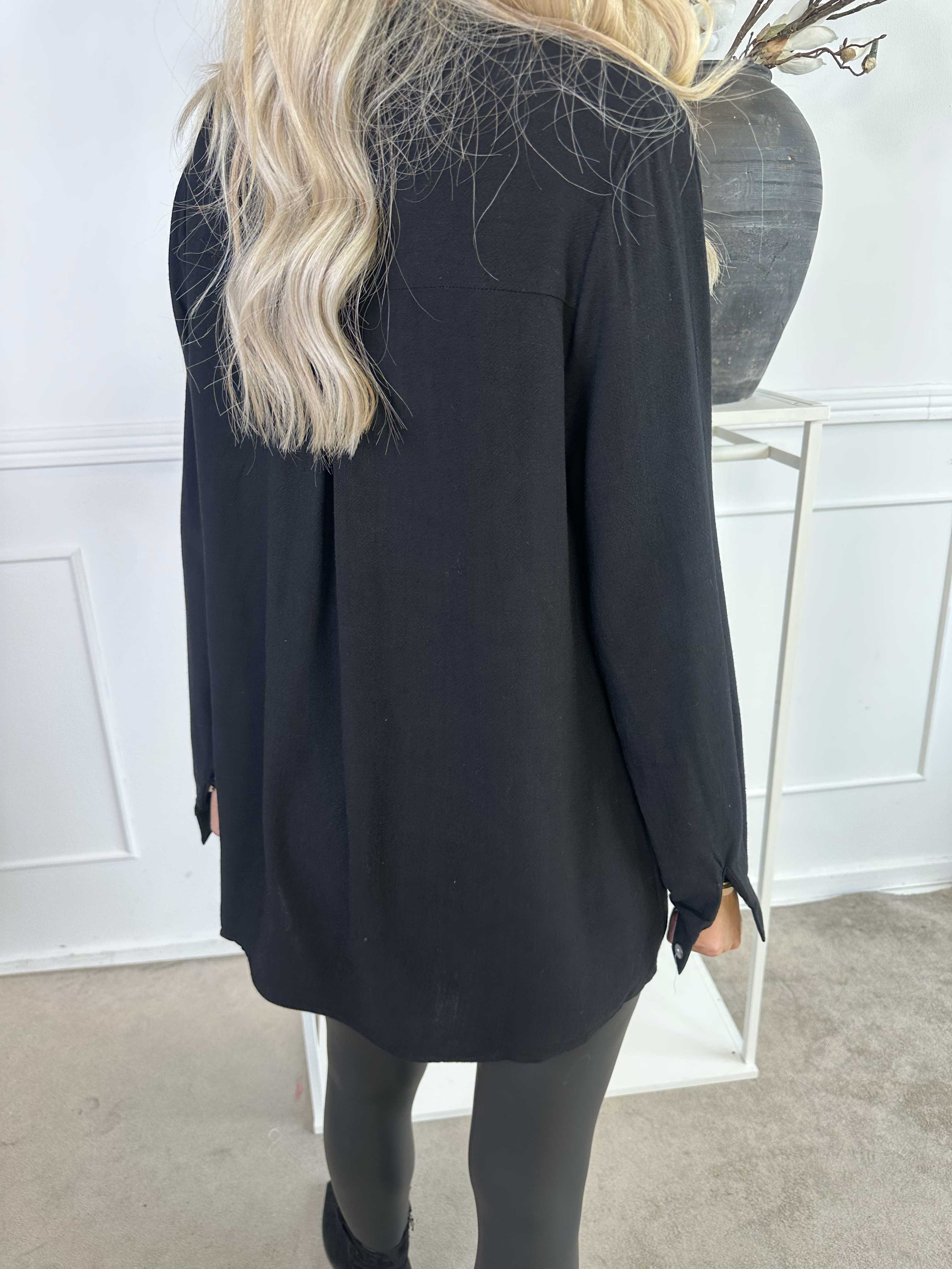 Benna - Ensfarvet tunika lavet i blød viskose