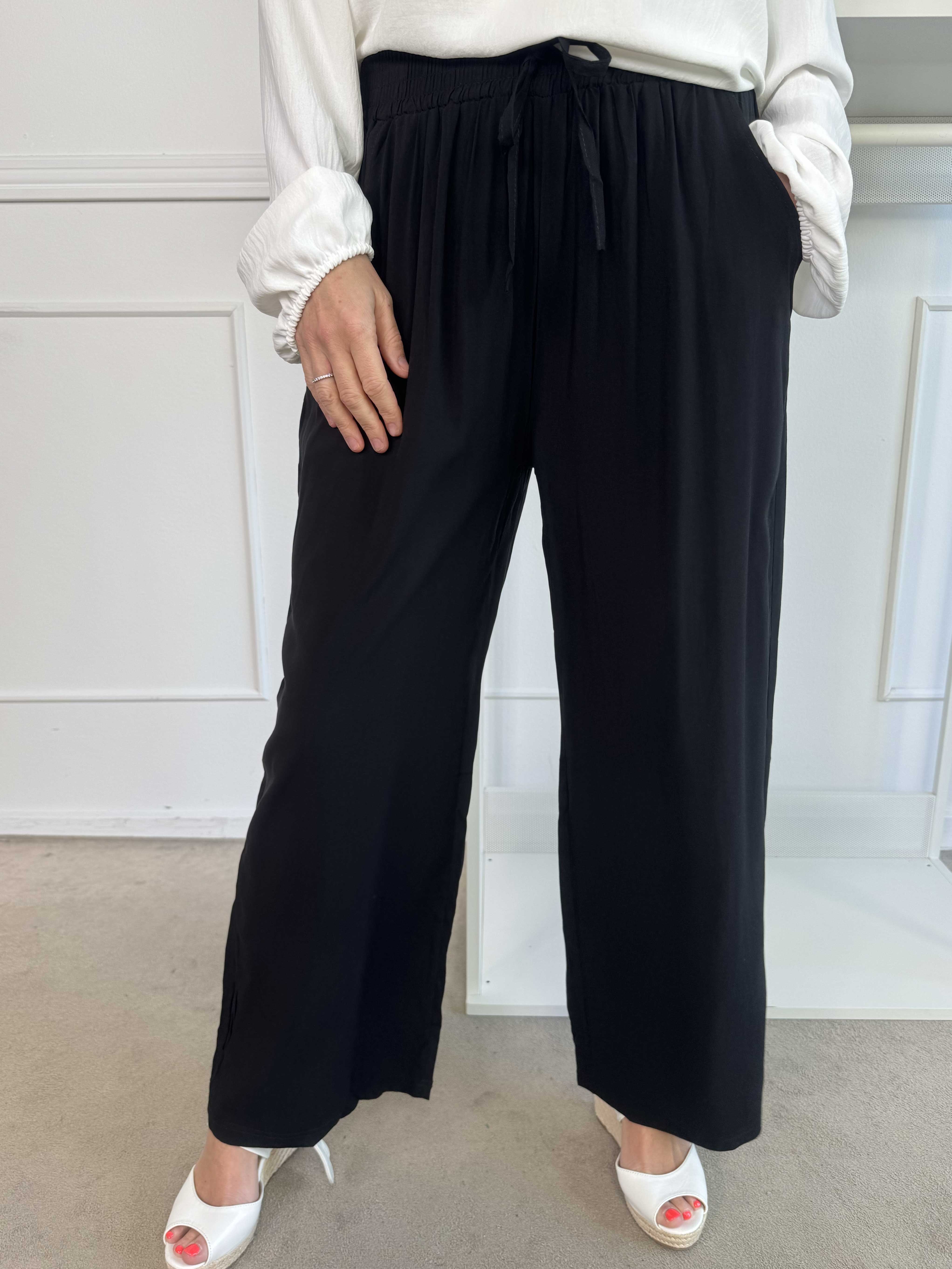 Camila - Ensfarvet løse bukser med elastikkant i livet