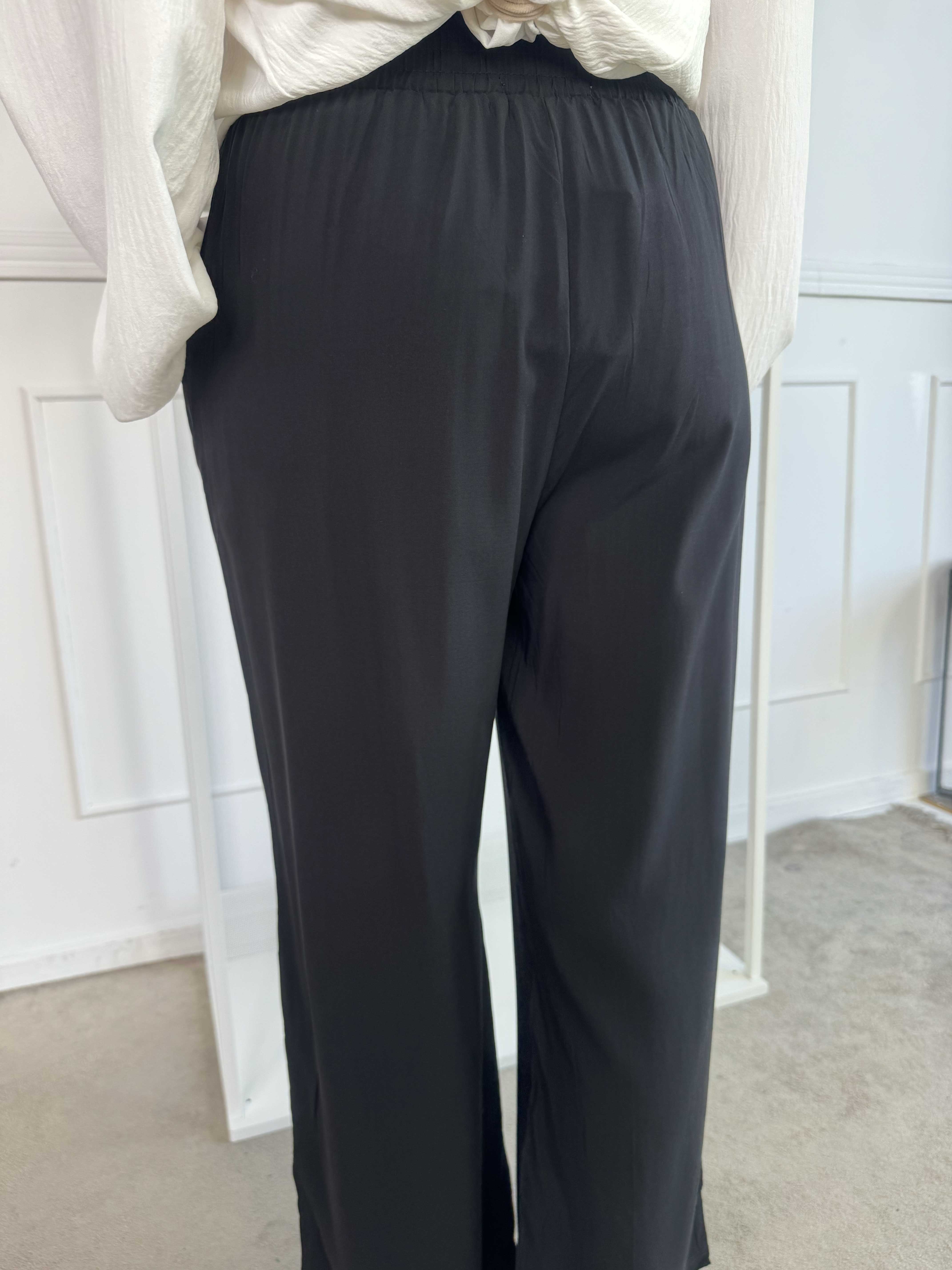 Camila - Ensfarvet løse bukser med elastikkant i livet