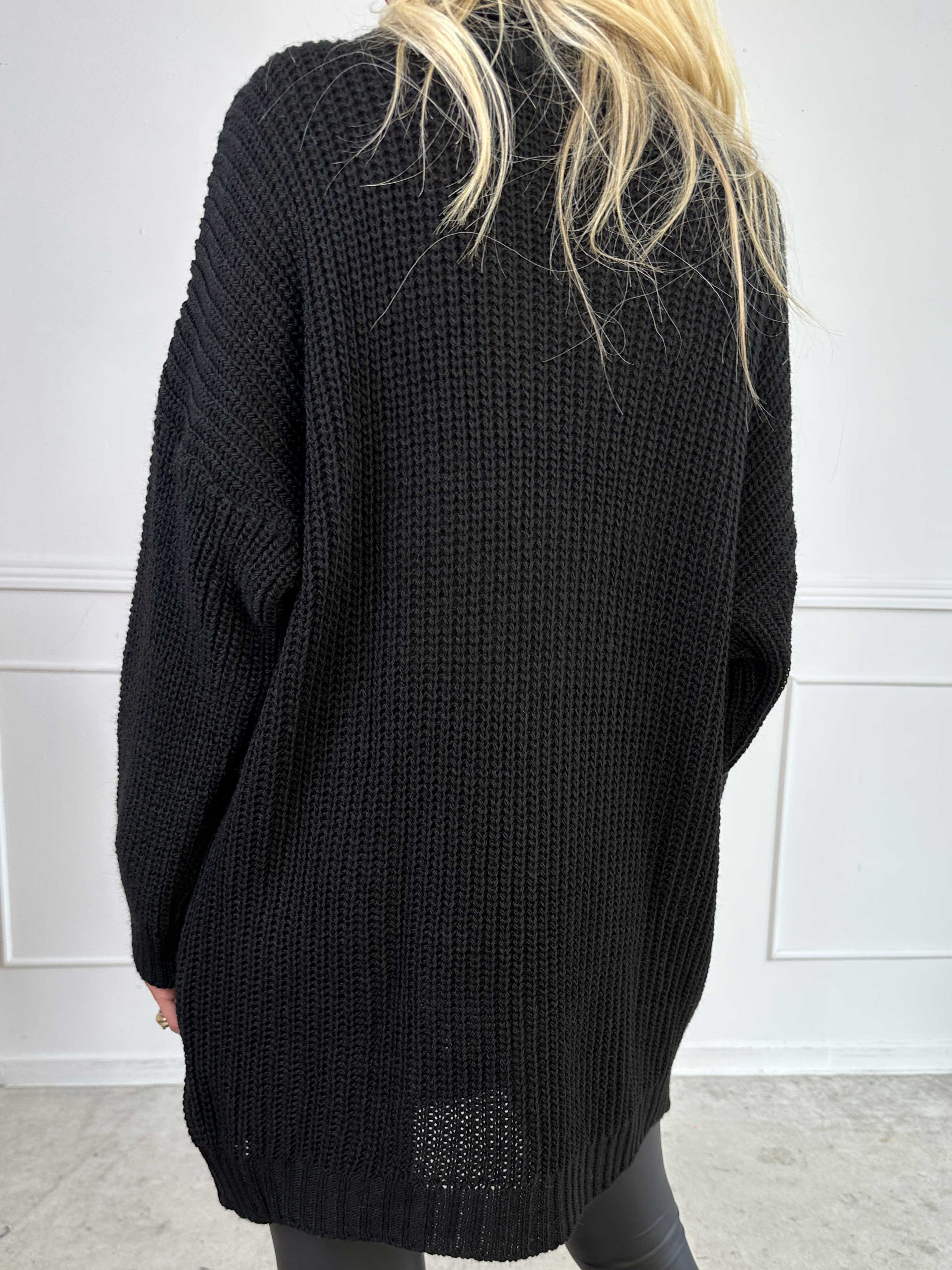 Cindy - Ensfarvet hyggelig striktrøje med rullekrave