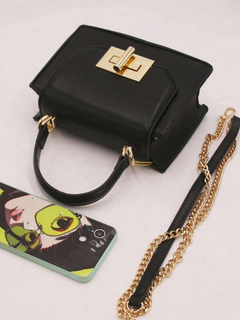 Clara - Lille håndtaske med guldspænde