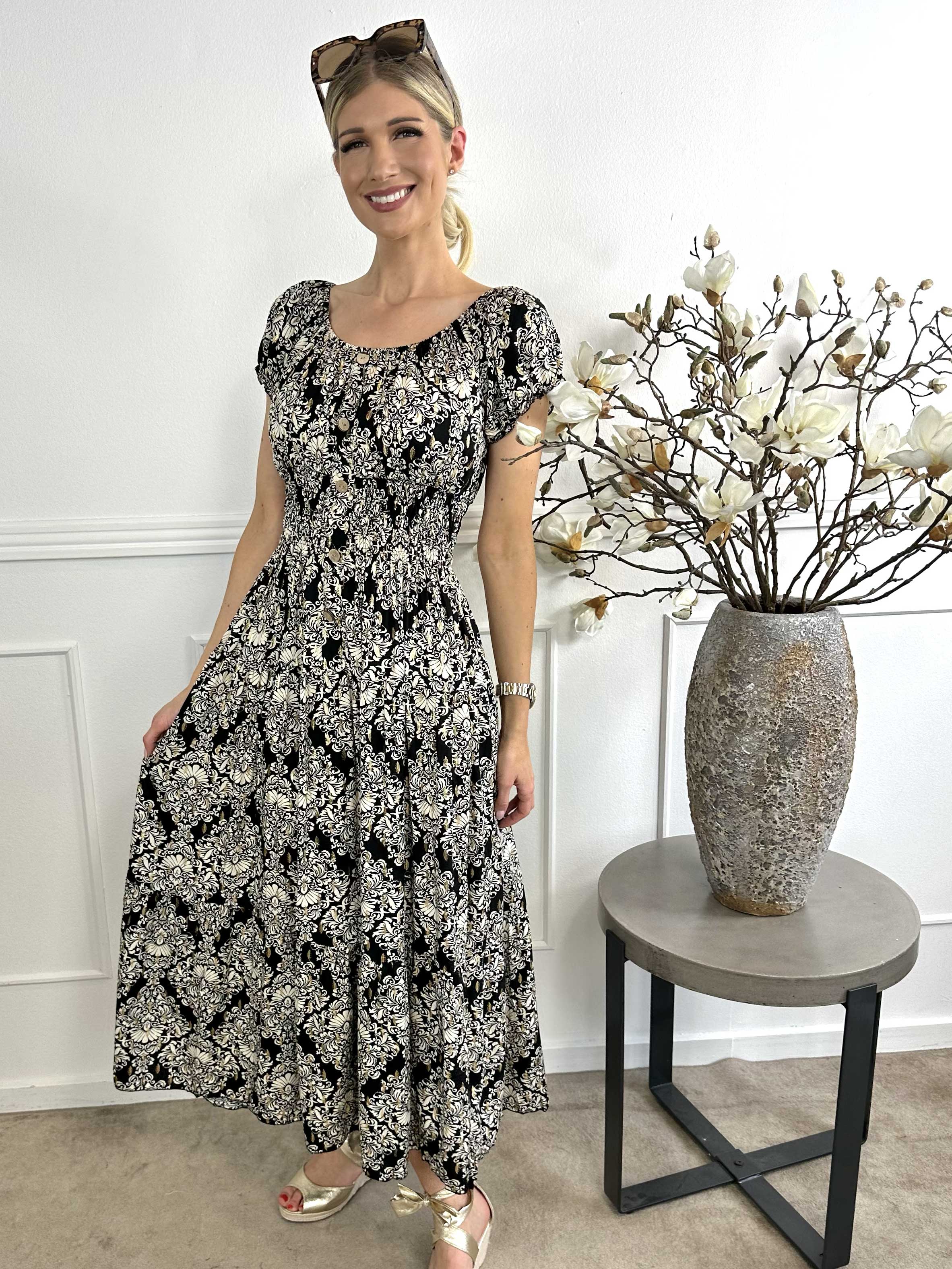 Elise - Lang mønstret kjole med elastik i udskæringen