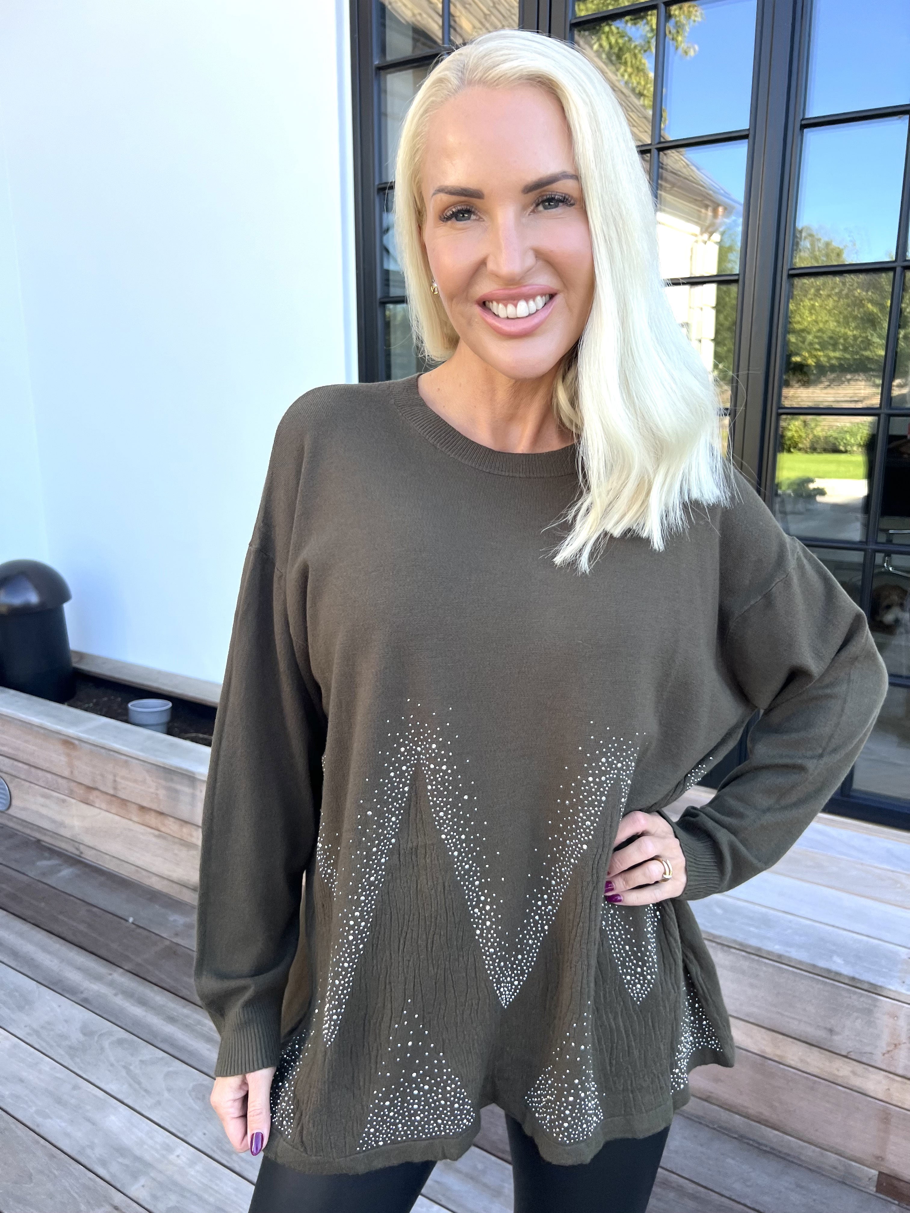 Ellrun - Blød strikbluse med zigzag af similisten i bunden