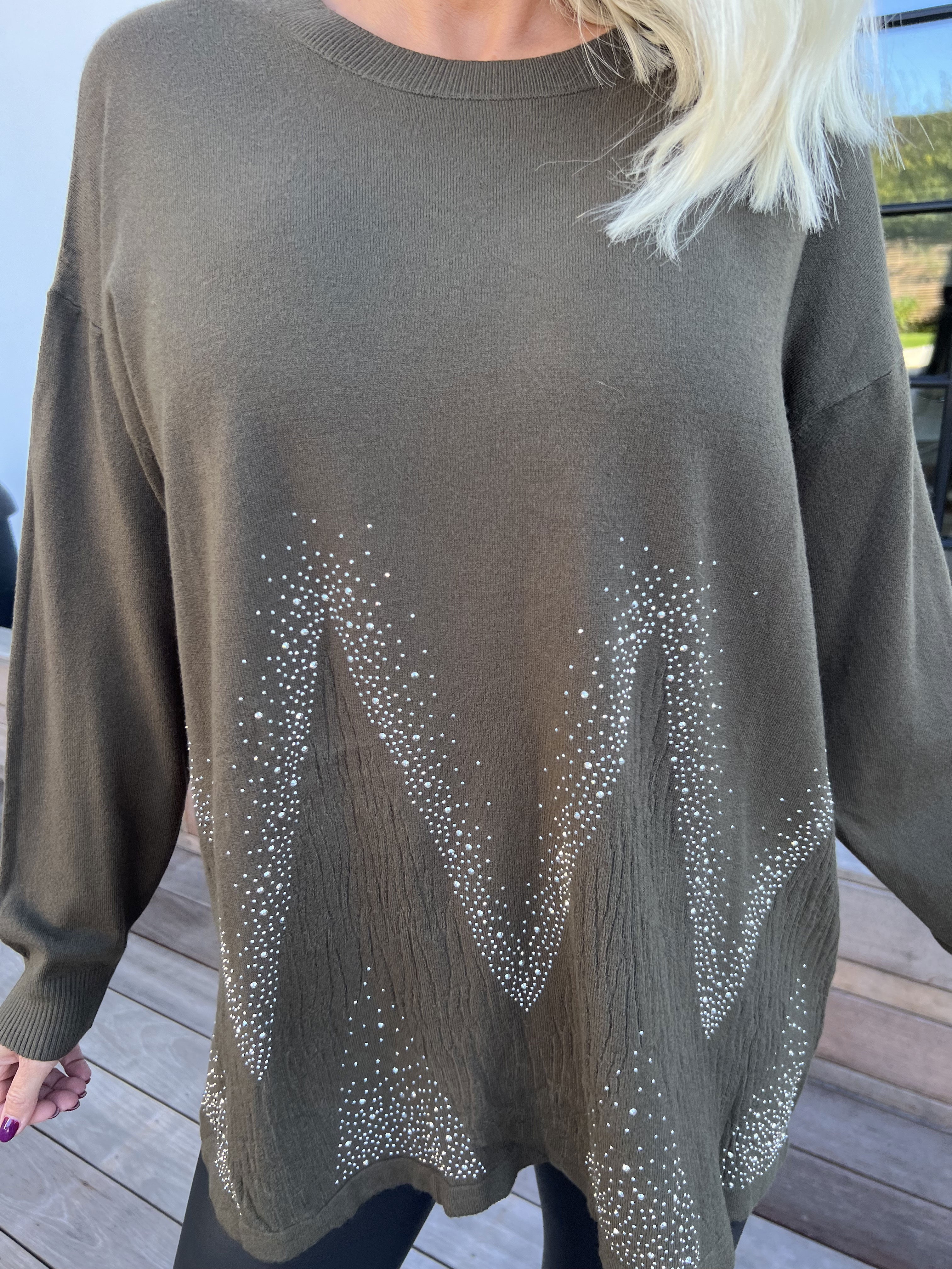 Ellrun - Blød strikbluse med zigzag af similisten i bunden