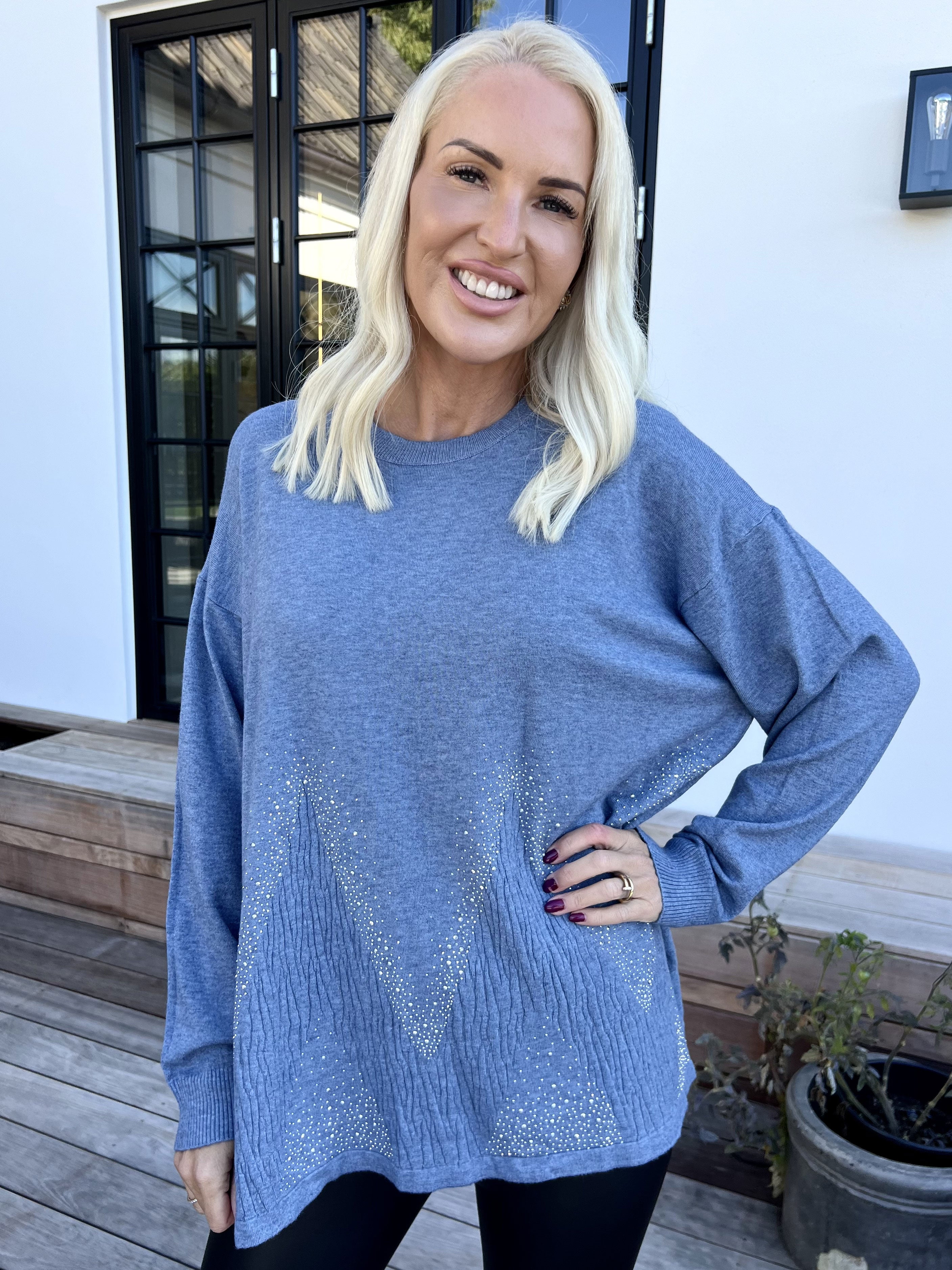 Ellrun - Blød strikbluse med zigzag af similisten i bunden