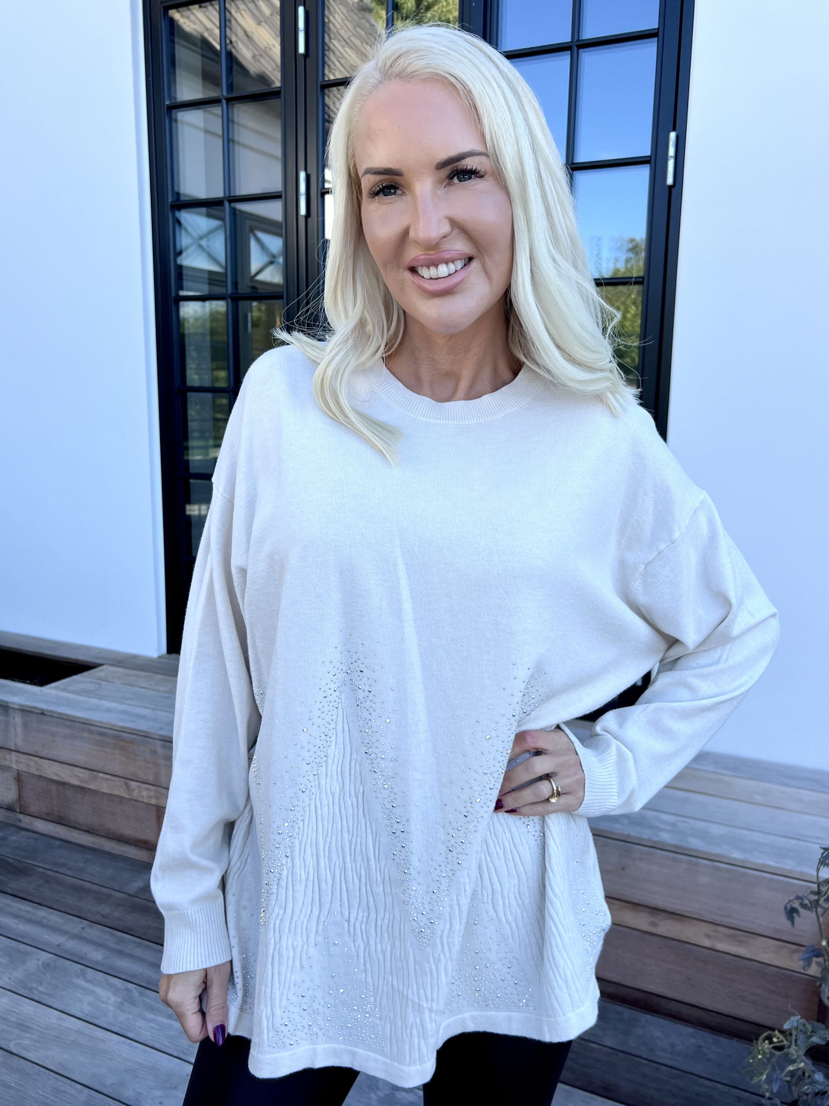 Ellrun - Blød strikbluse med zigzag af similisten i bunden