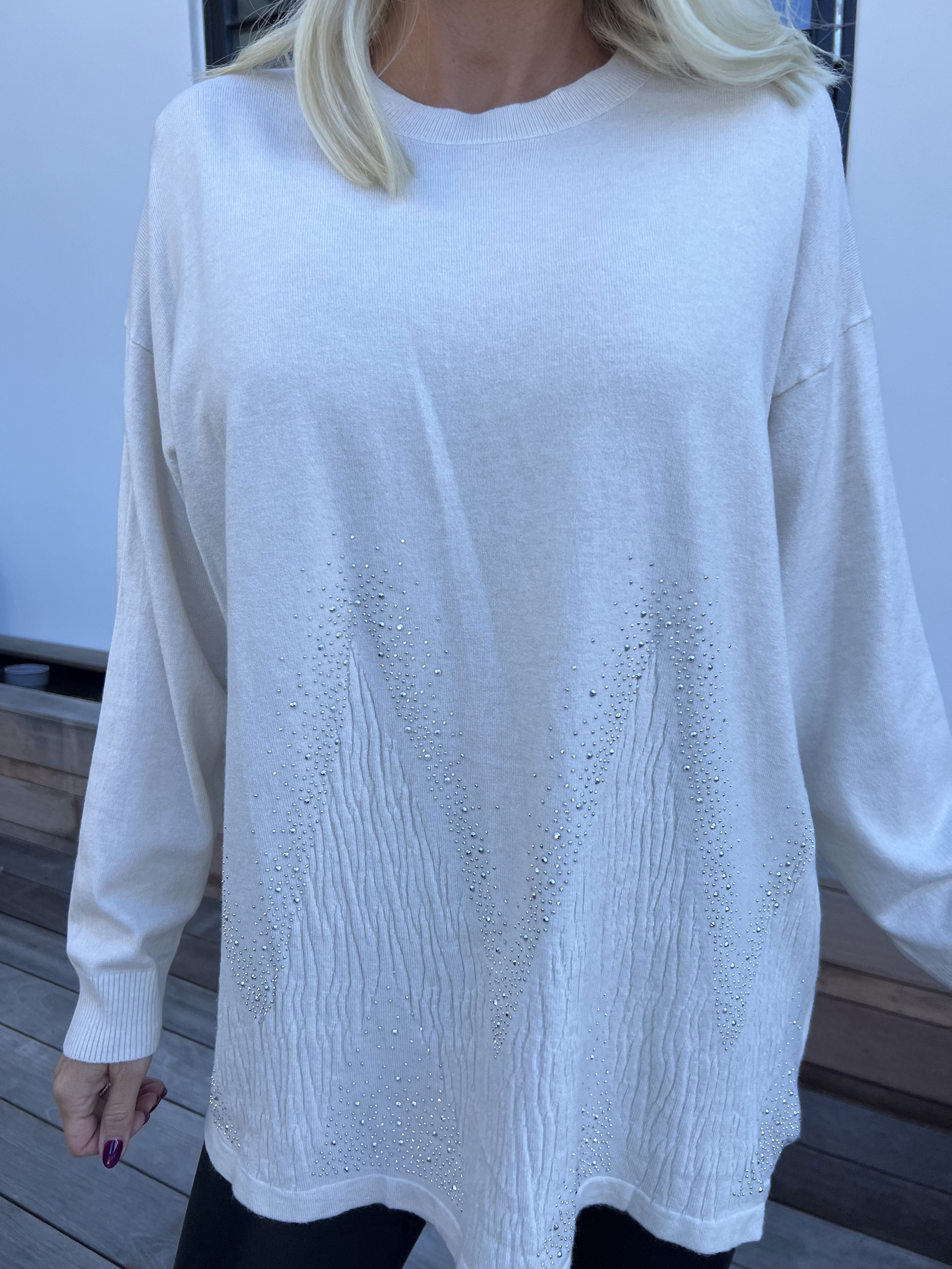 Ellrun - Blød strikbluse med zigzag af similisten i bunden