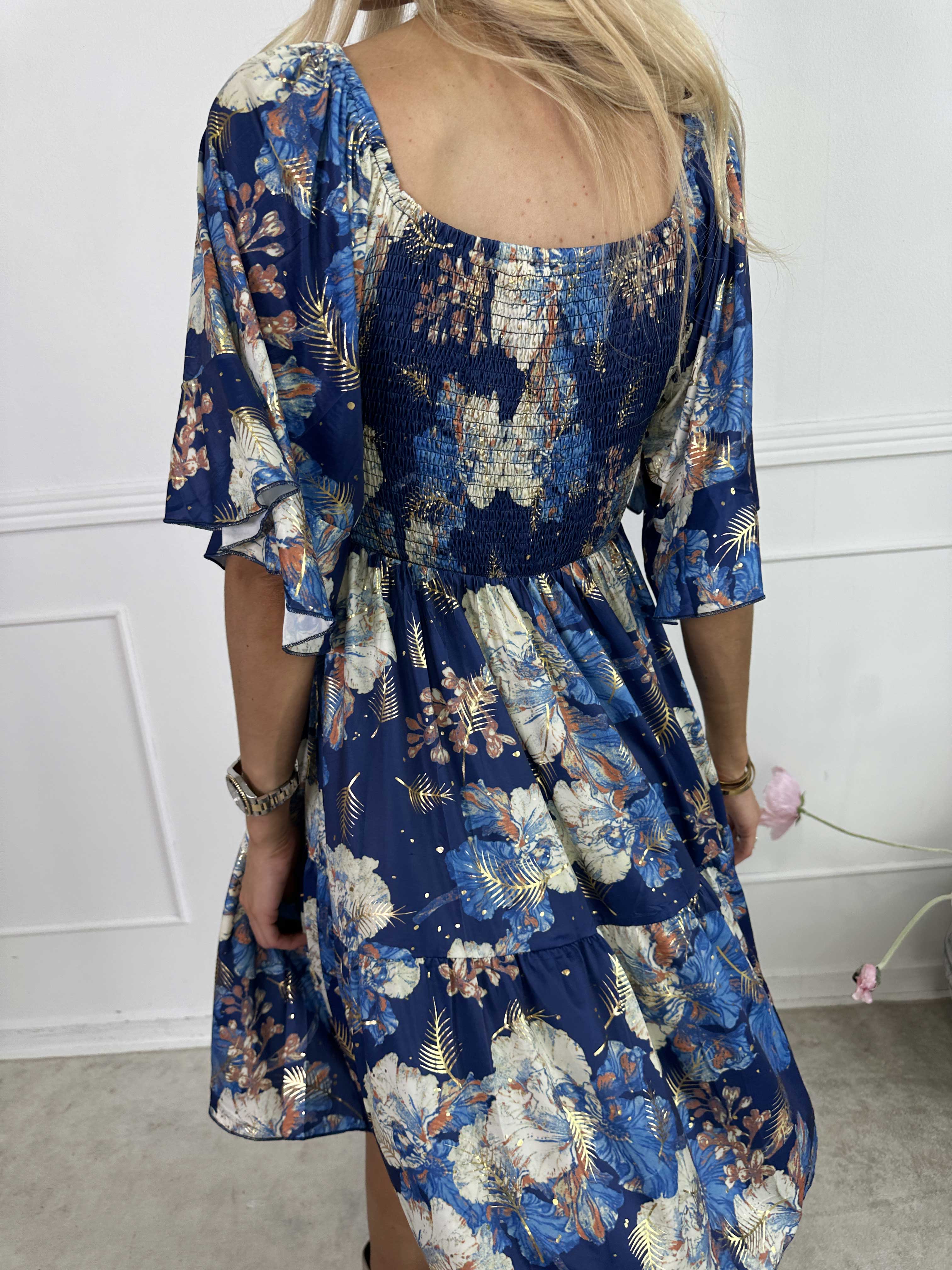 Elna Beautiful Short - Blomstret elastisk kjole med smock over brystet