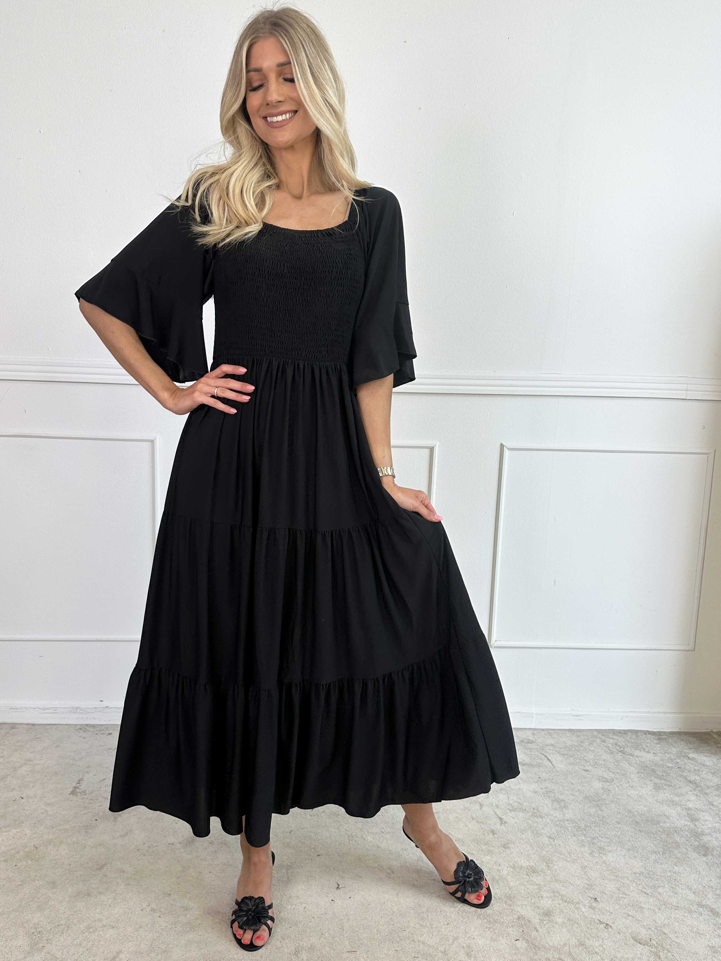 Elna Plain - Lang elastisk plain kjole med smock over brystet