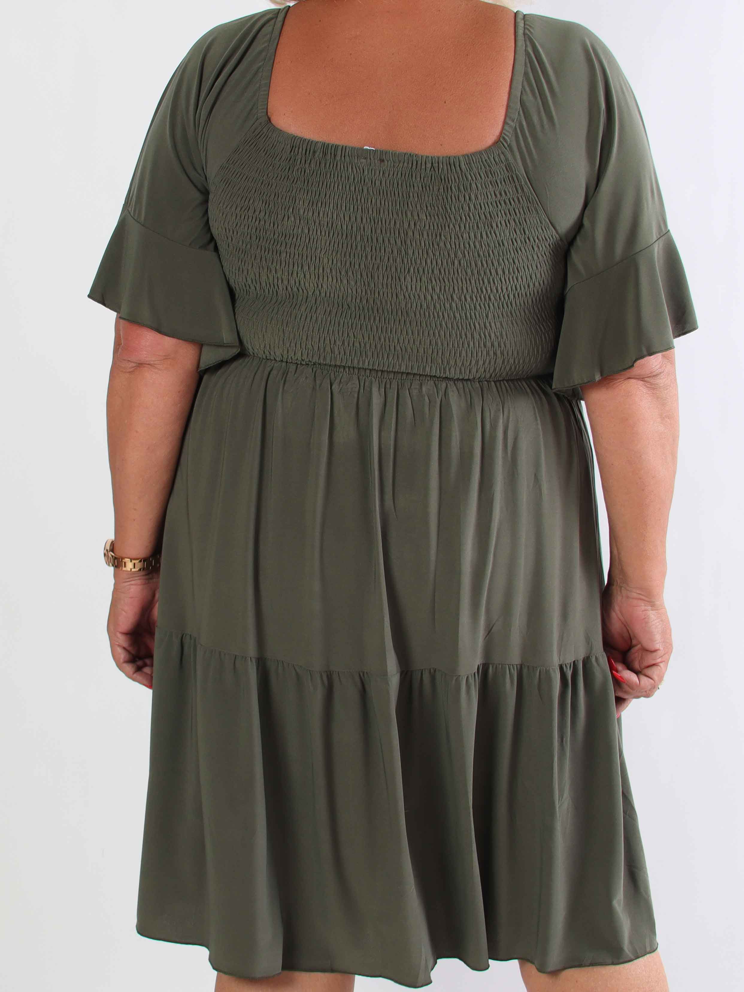 Elna Plain Short - Elastisk plain plus size kjole med smock over brystet